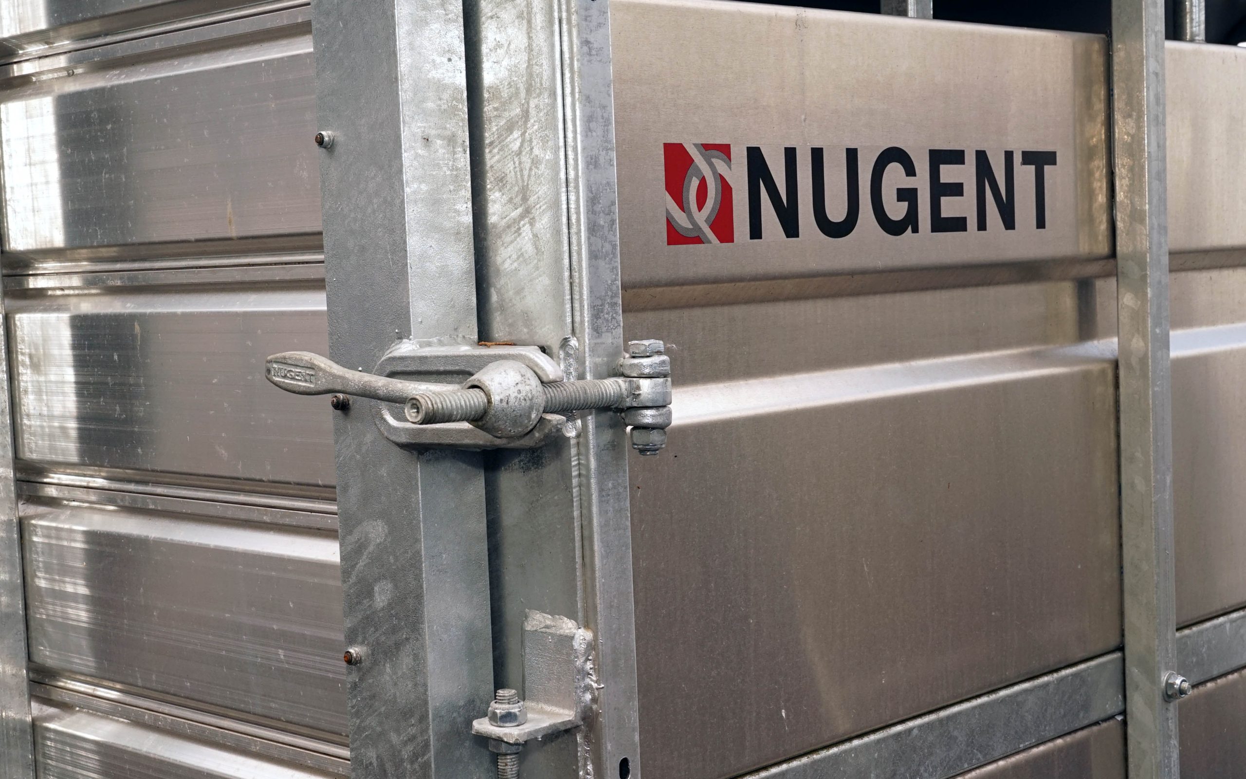 A better way of securing the tail door of a stock trailer than the the standard screw fastener has yet to be found, according to Nugent.