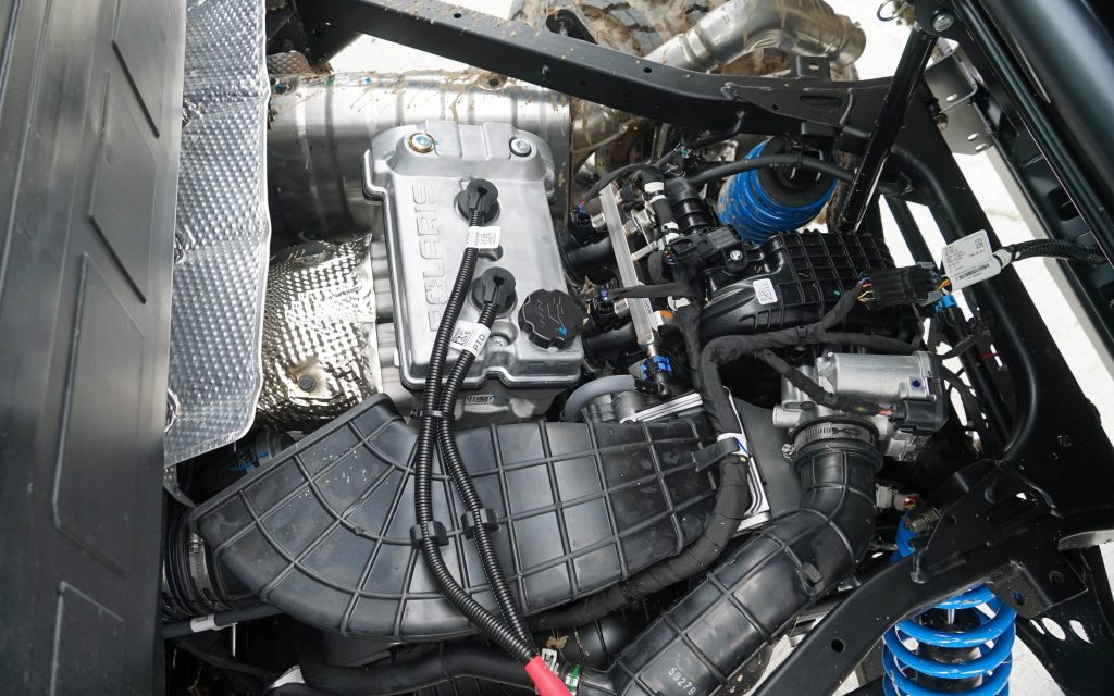 The 1,000cc two cylinder petrol engine is Polaris's own  and sits low down in the frame to aid stability