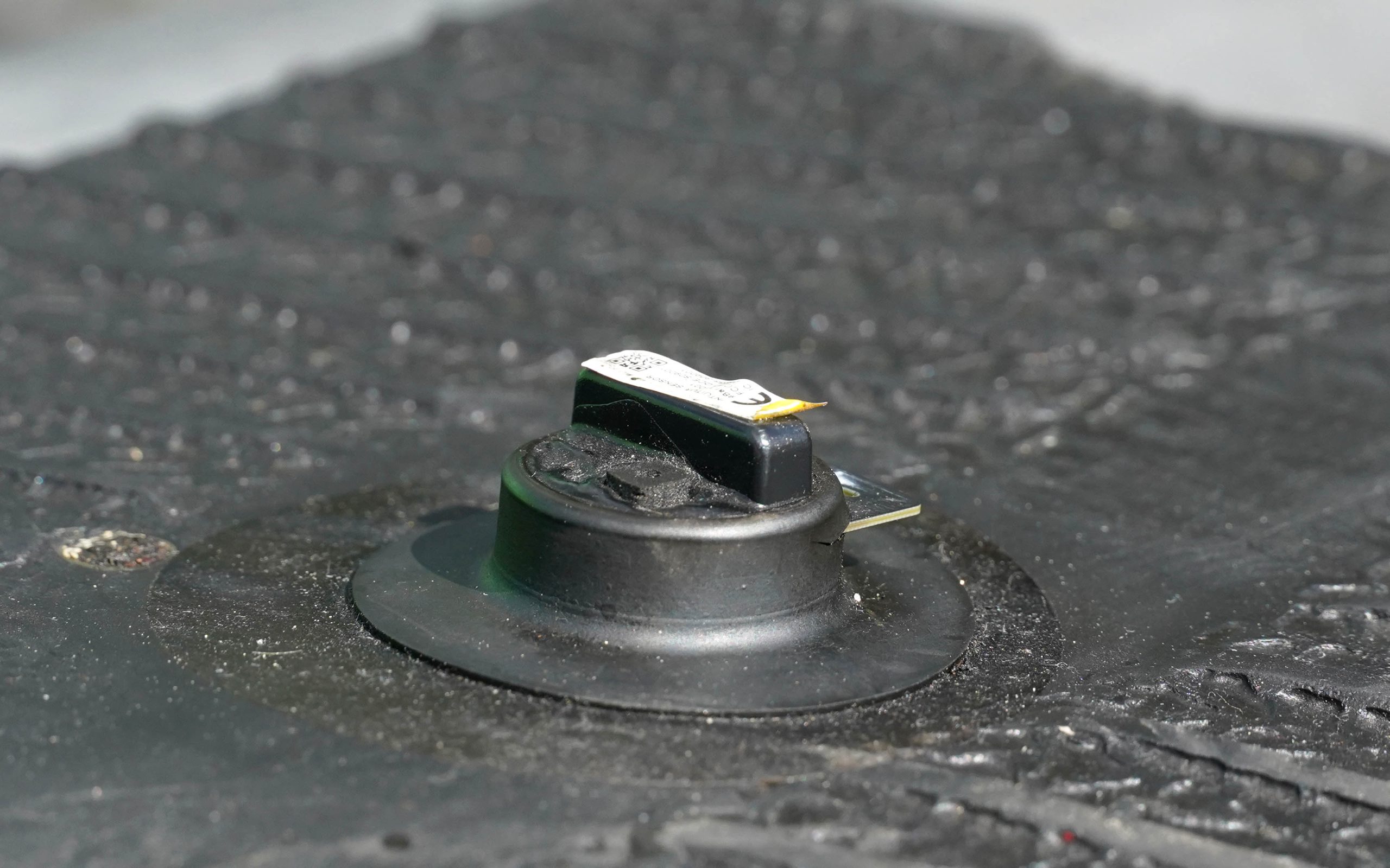 The tyre sensor is stuck to the inside of the tread to monitor temperature and pressure