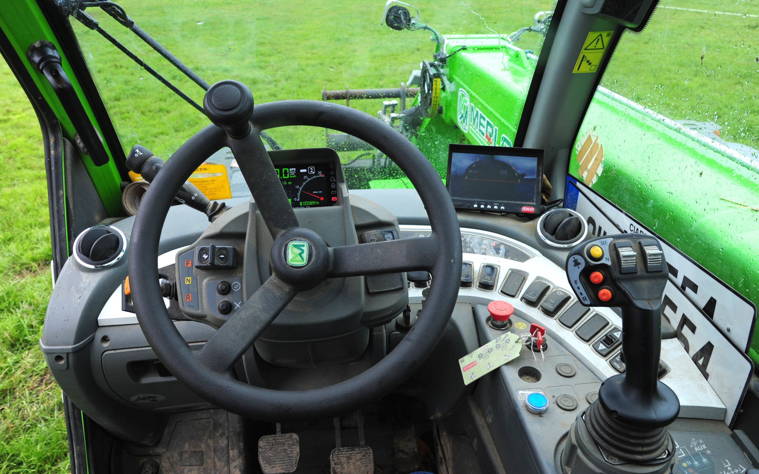 The cab is neatly laid out with excellent forward visibility