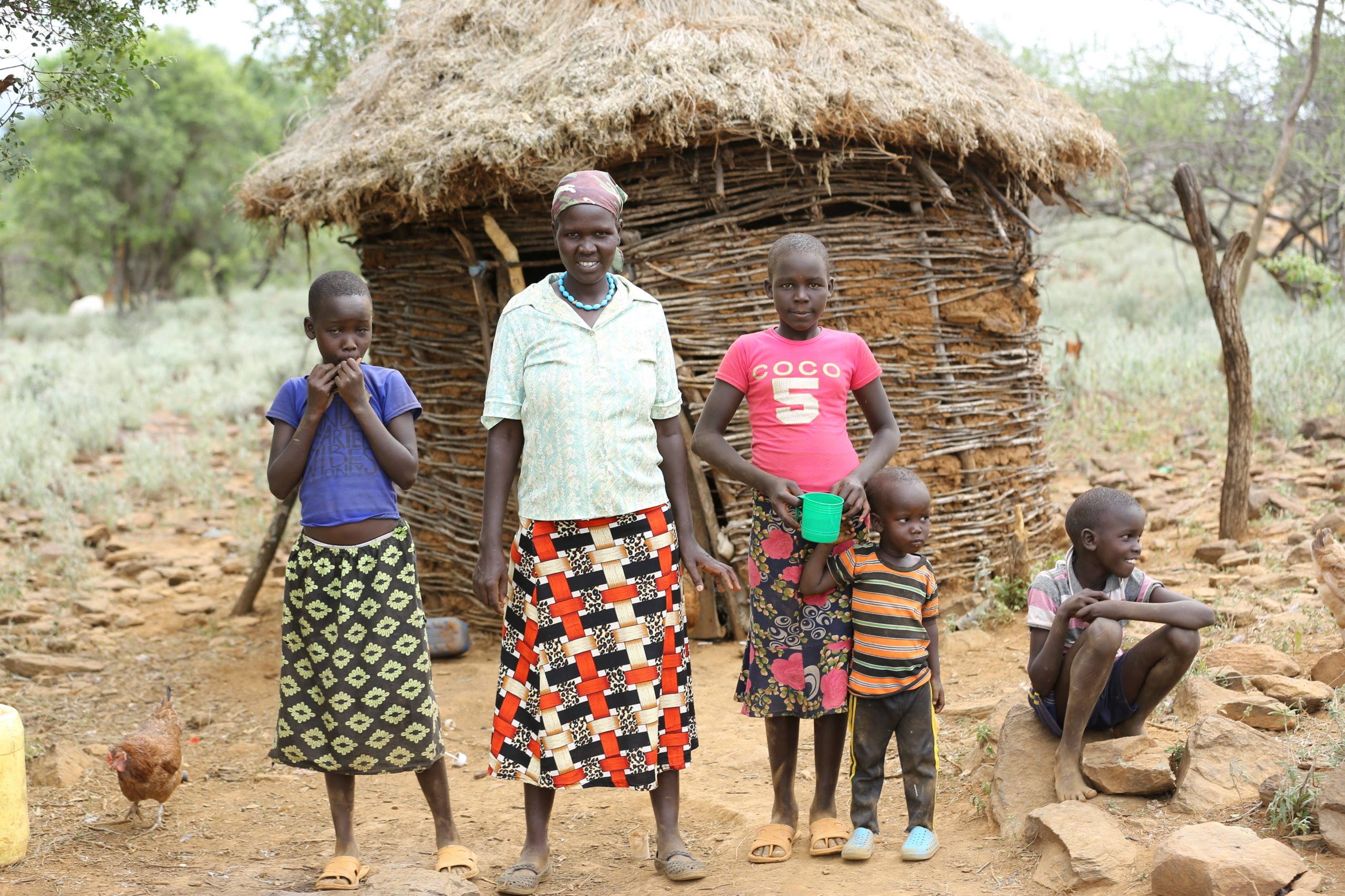 Lilian Kura, a smal- scale farmer from the Kadogoi village in northern Kenya with her two daughters and two sons. Source: Self Help Africa