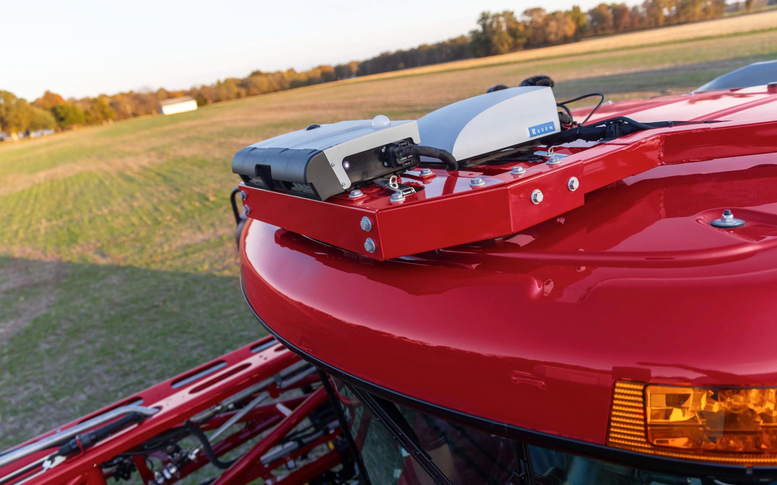 A single camera sensor on the sprayer roof controls the spot spraying system