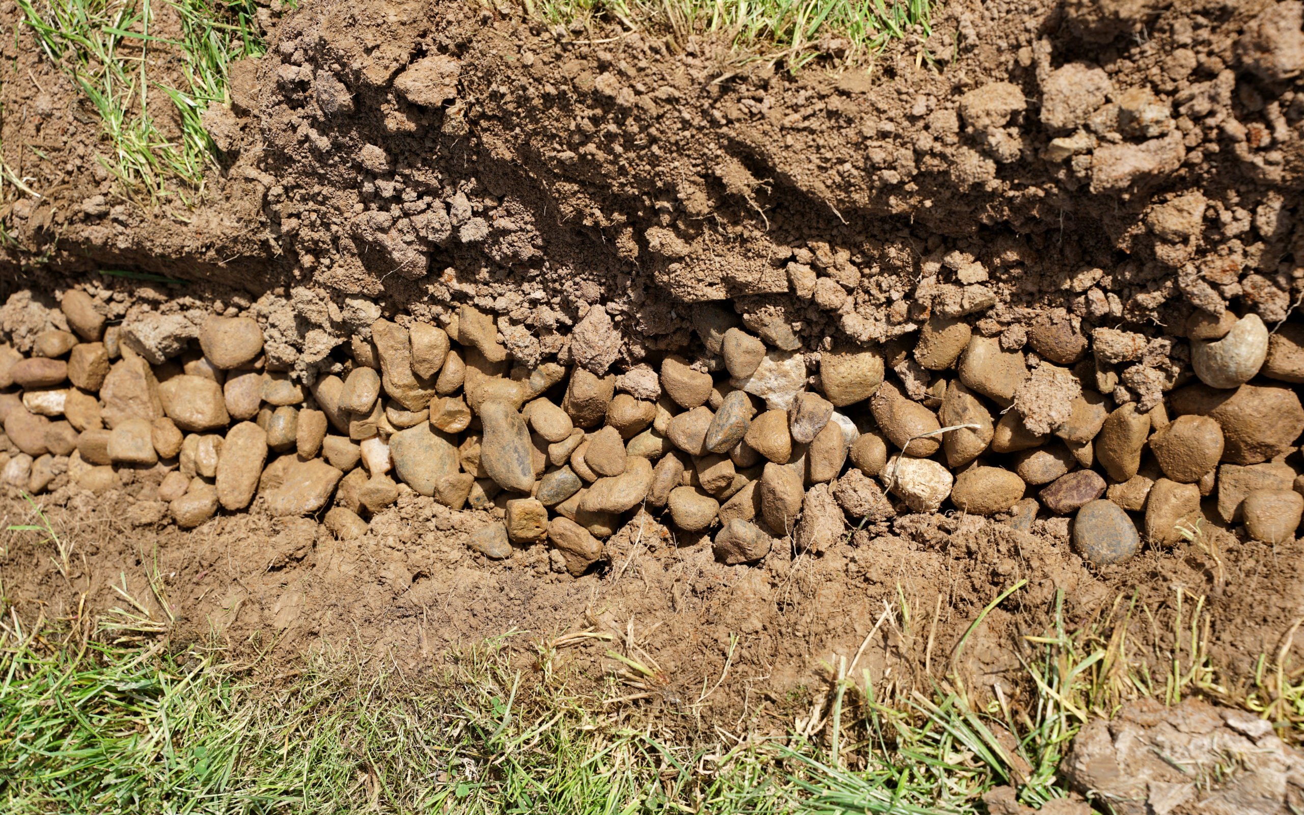 A 15cm-wide slot filled with pebbles and spaced at 5m is the answer to saturated ground, according to James Coen