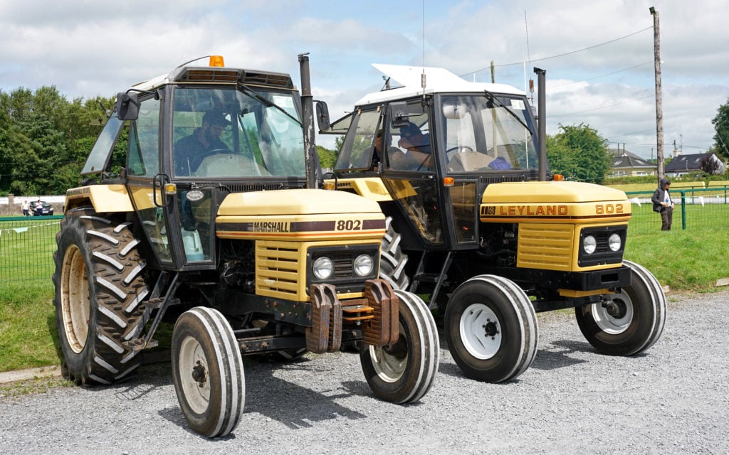 The same tractor but with different names on the bonnets. The Leyland Golden Harvest livery was introduced shortly before the sale to Marshalls