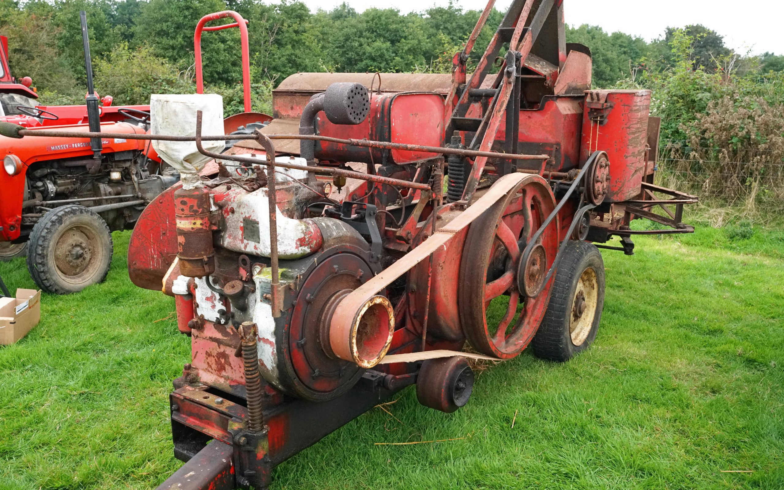 With tractors often struggling to provide power enough to tow implements auxiliary engines were a feature of many machines. This baler made in the Kilmarnock factory is fitted with a two cylinder Armstrong Siddeley engine making 21hp, which is as much as many of the tractors of the era
