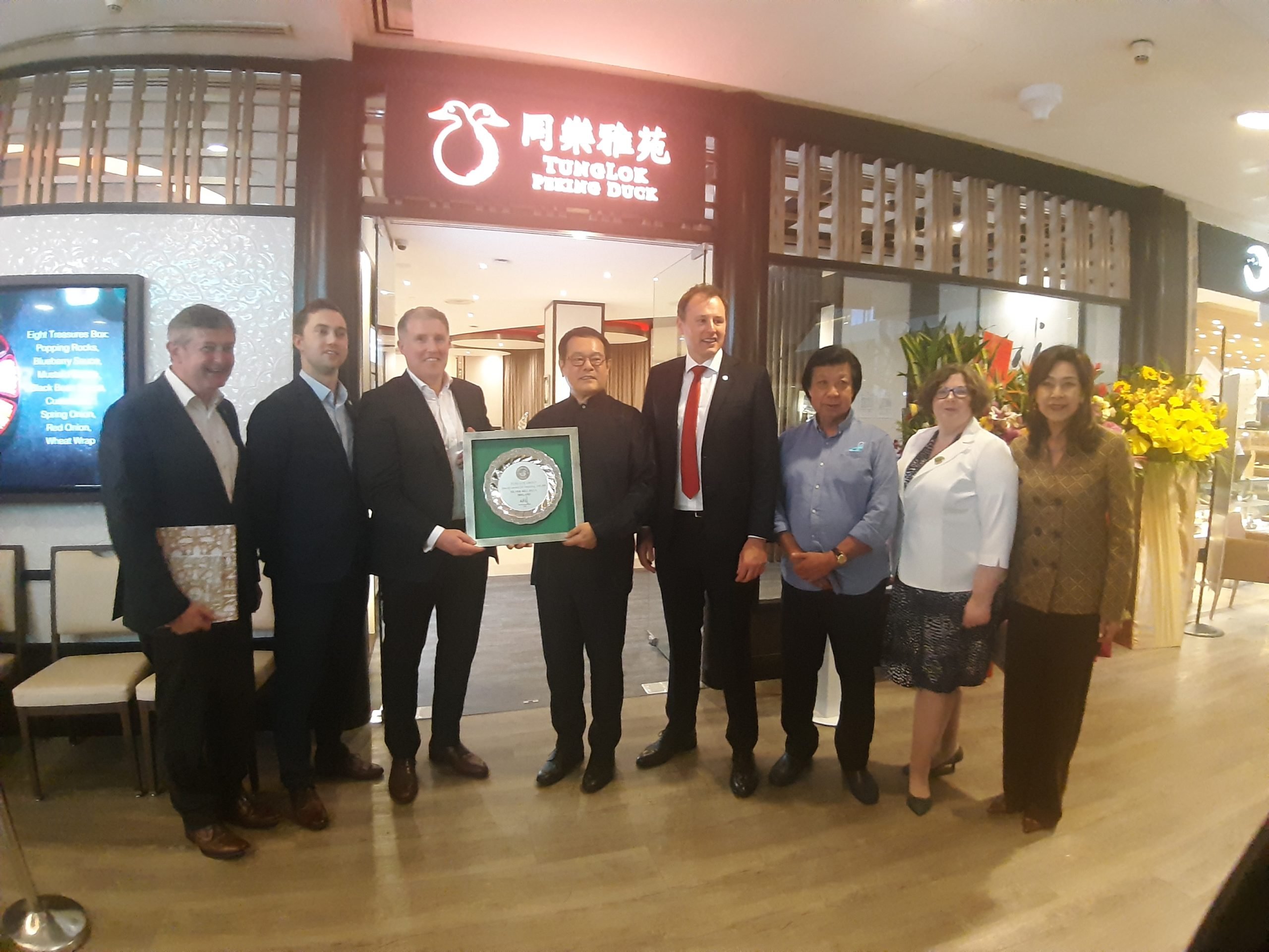 Minister for Agriculture, Food and the Marine Charlie McConalogue joined Micheál Briody, managing director of Silver Hill Duck, in making a presentation to Andrew Tjioe, founder and chief executive of Tung Lok Group
