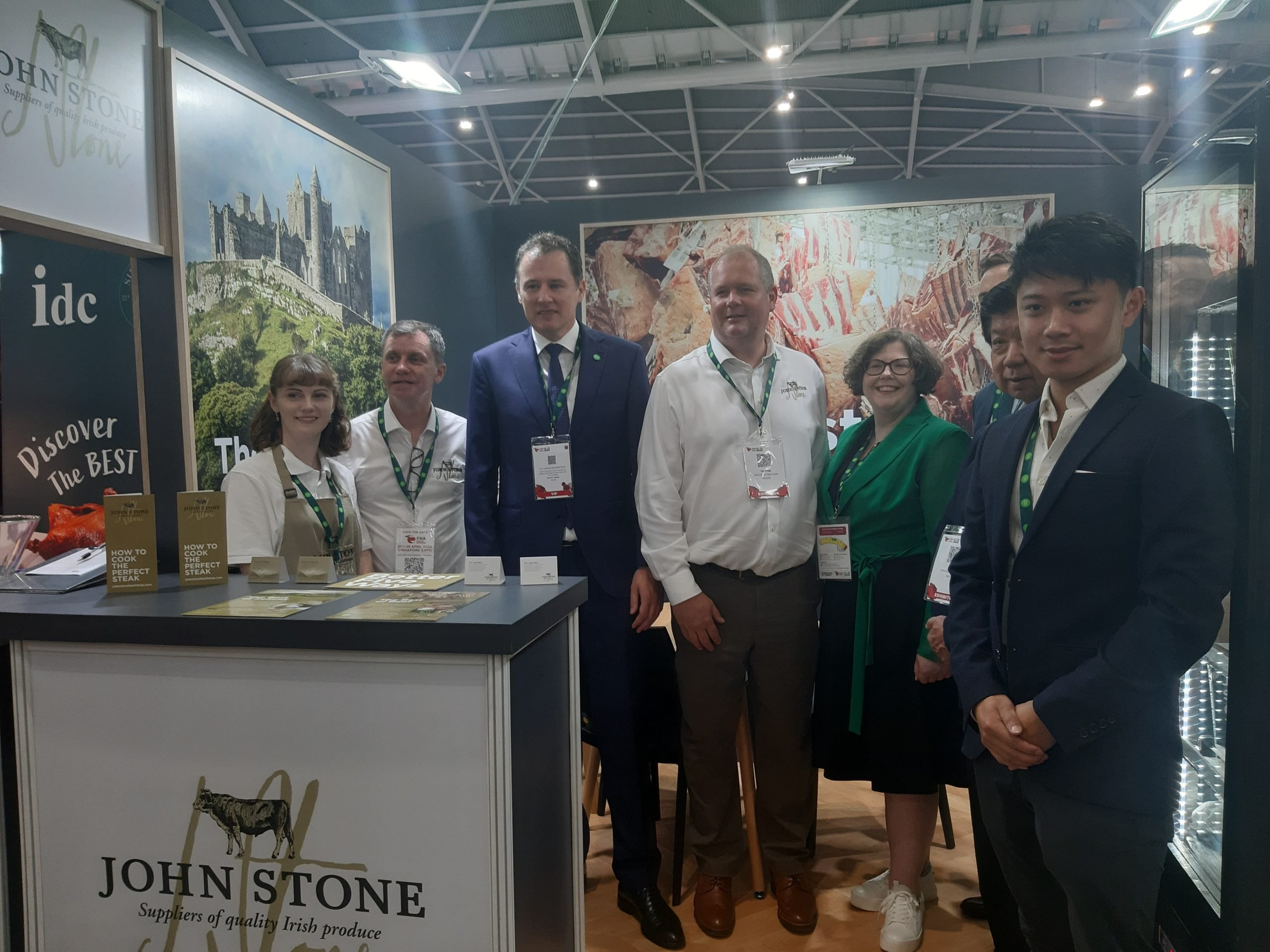 Minister for Agriculture, Food and the Marine, Charlie McConalogue with the John Stone team on the Bord Bia Origin Green stand at the Food and Hotel Asia trade fair in Singapore