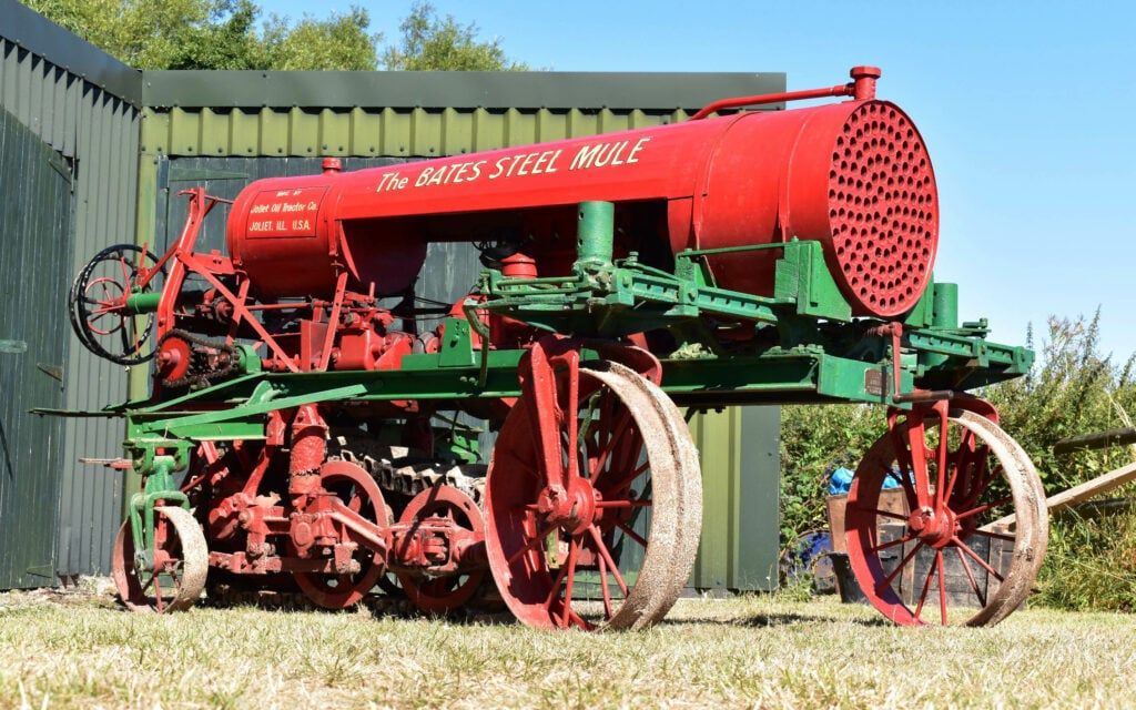 The bates Steel Mule was manufactured by the Joliet Oil Tractor Company and drives through a single caterpillar track at the rear