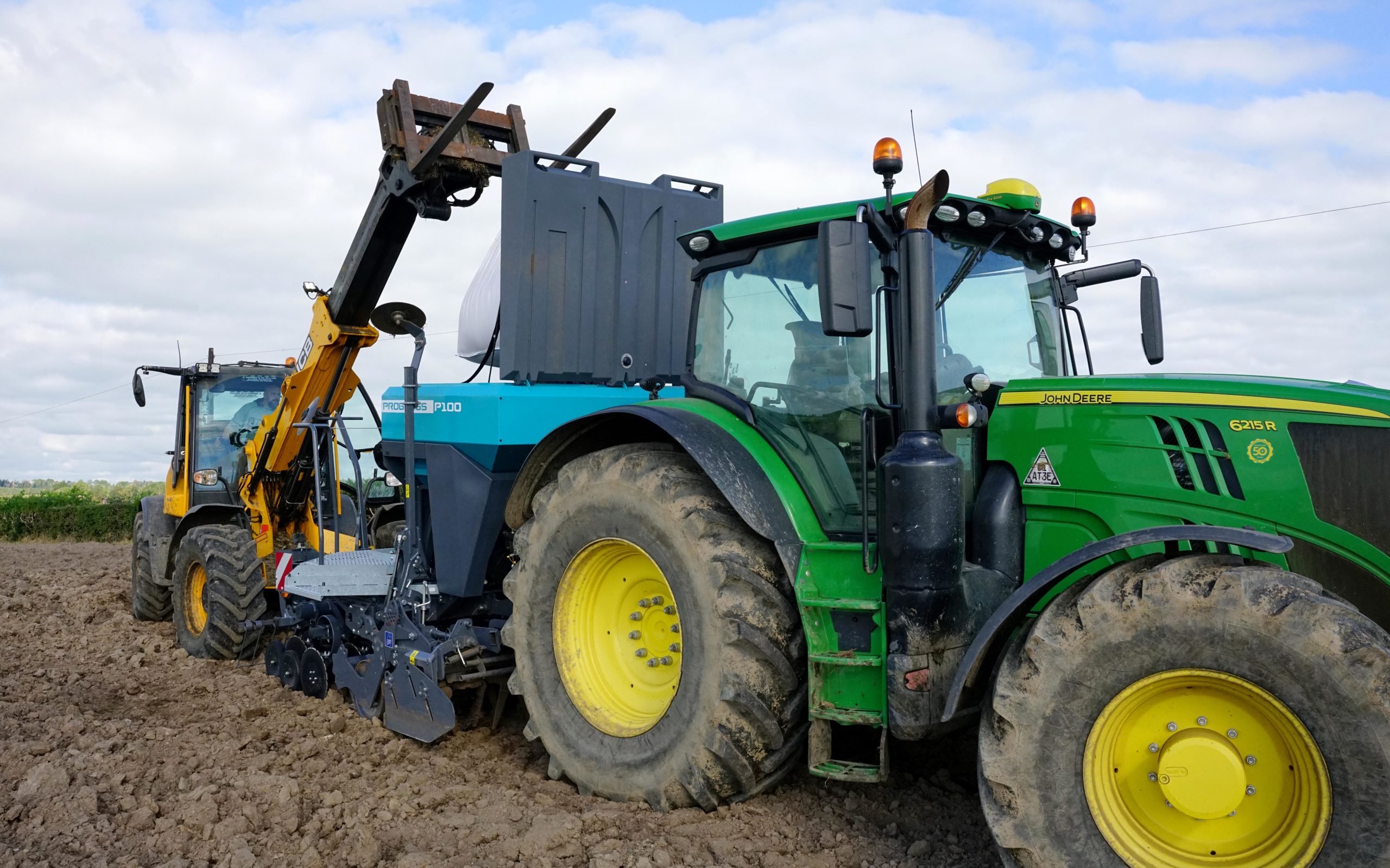 Loading the drill ready to go straight in after the plough in Co. Armagh