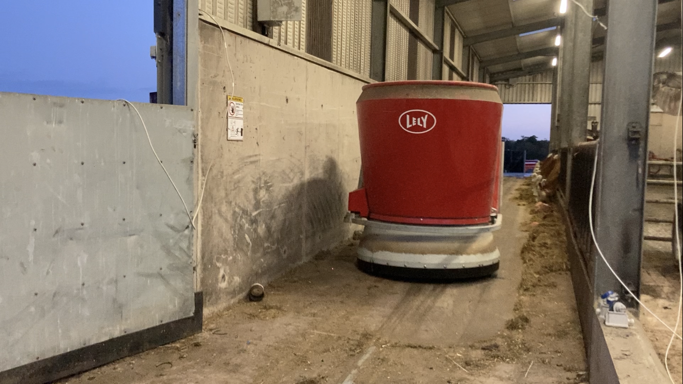 The vector scanning the feed passageway and pushing in any leftover feed