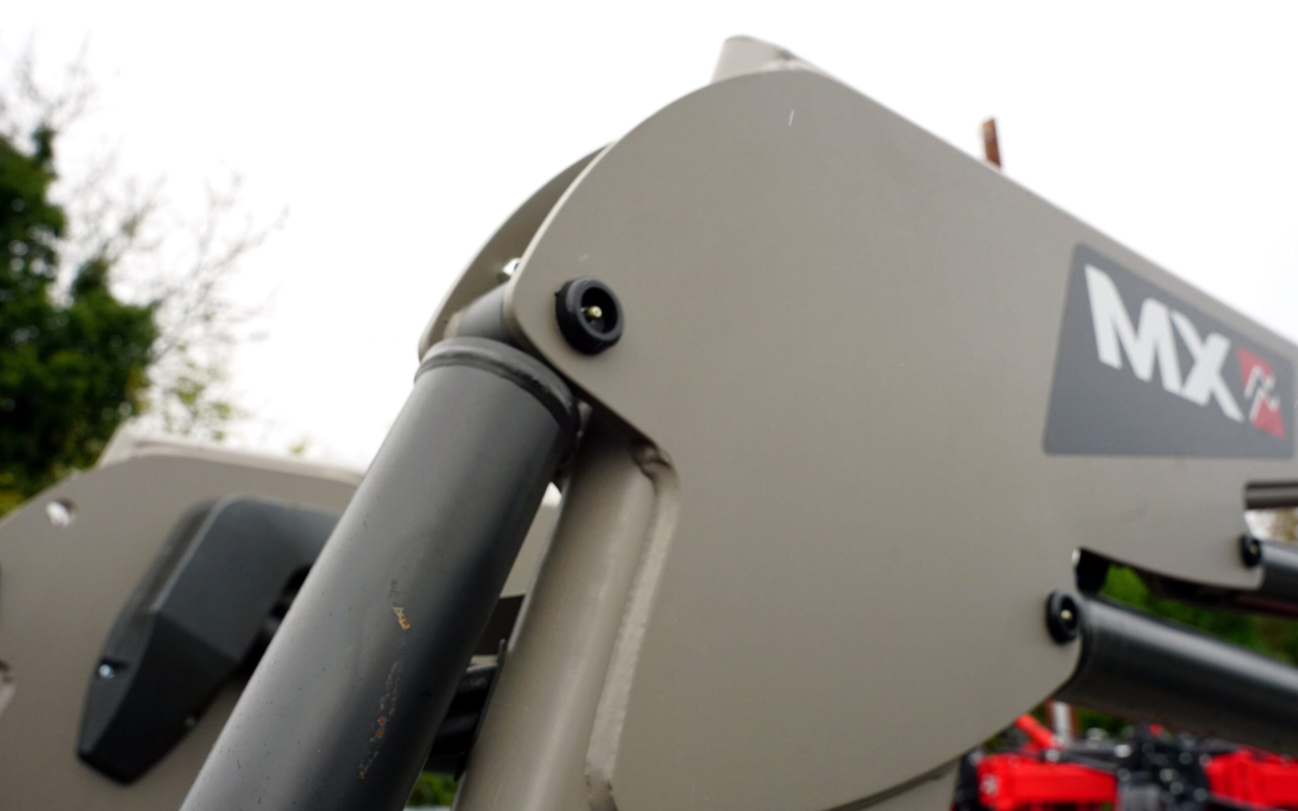 Farmec recommends a neutral colour for an older tractor as its paint might be faded