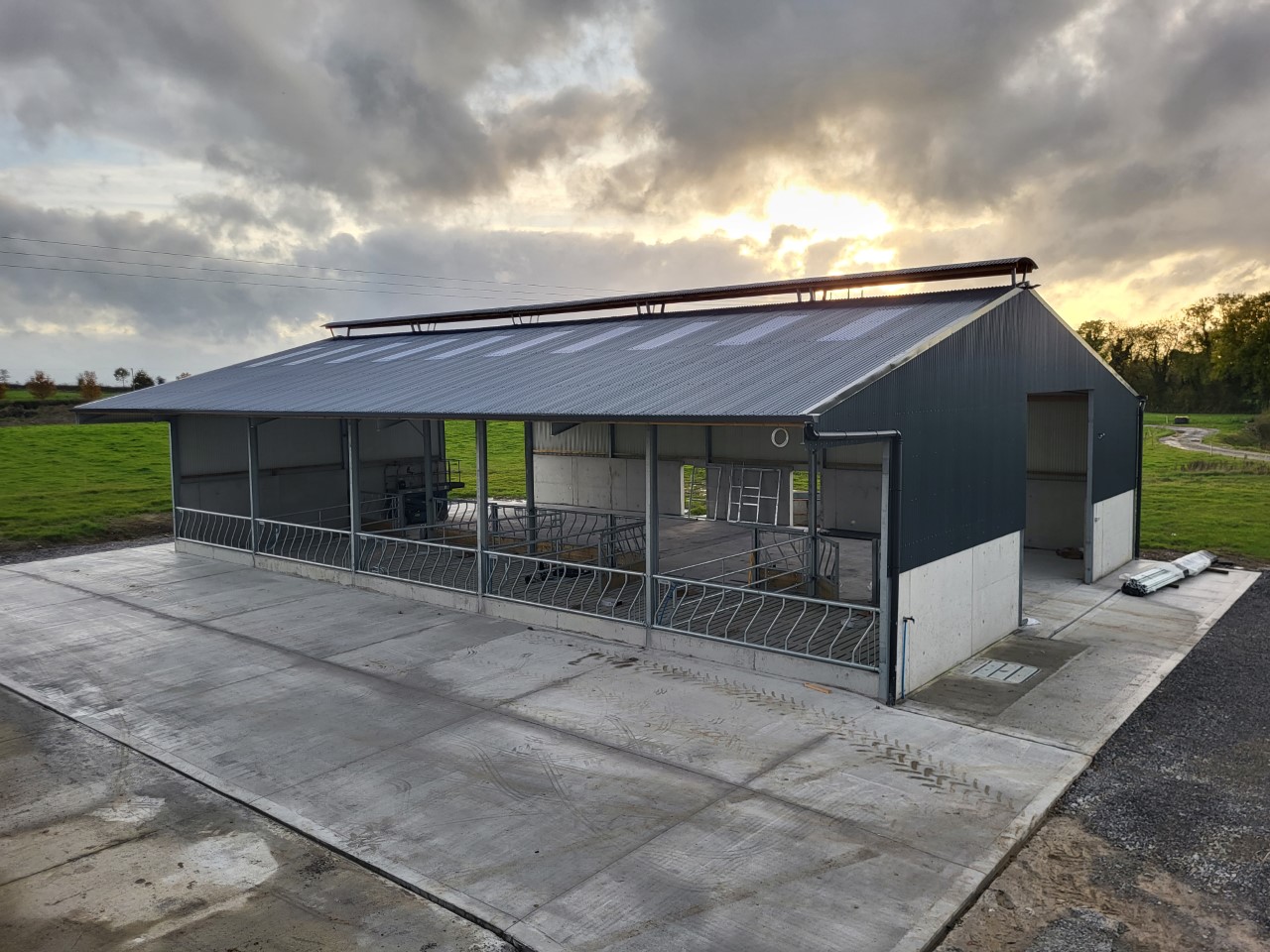The final stages of the build, fitting all the gates, feed barriers and doors just before the cattle were housed