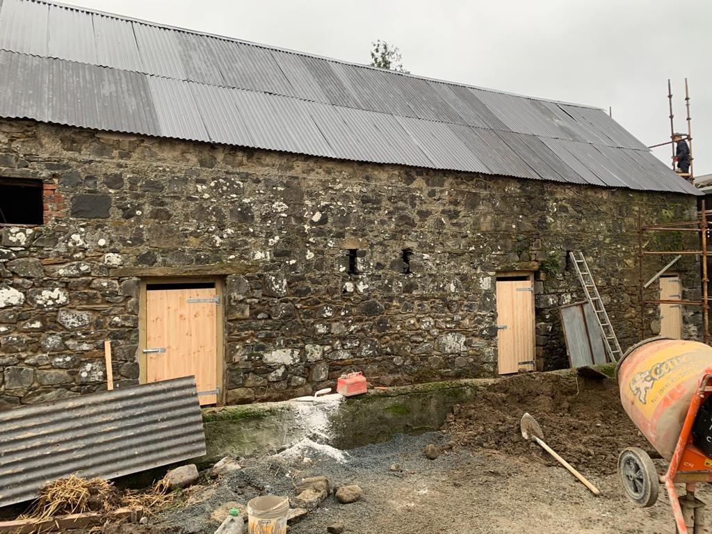 Space over doors to allow swallows access to nest