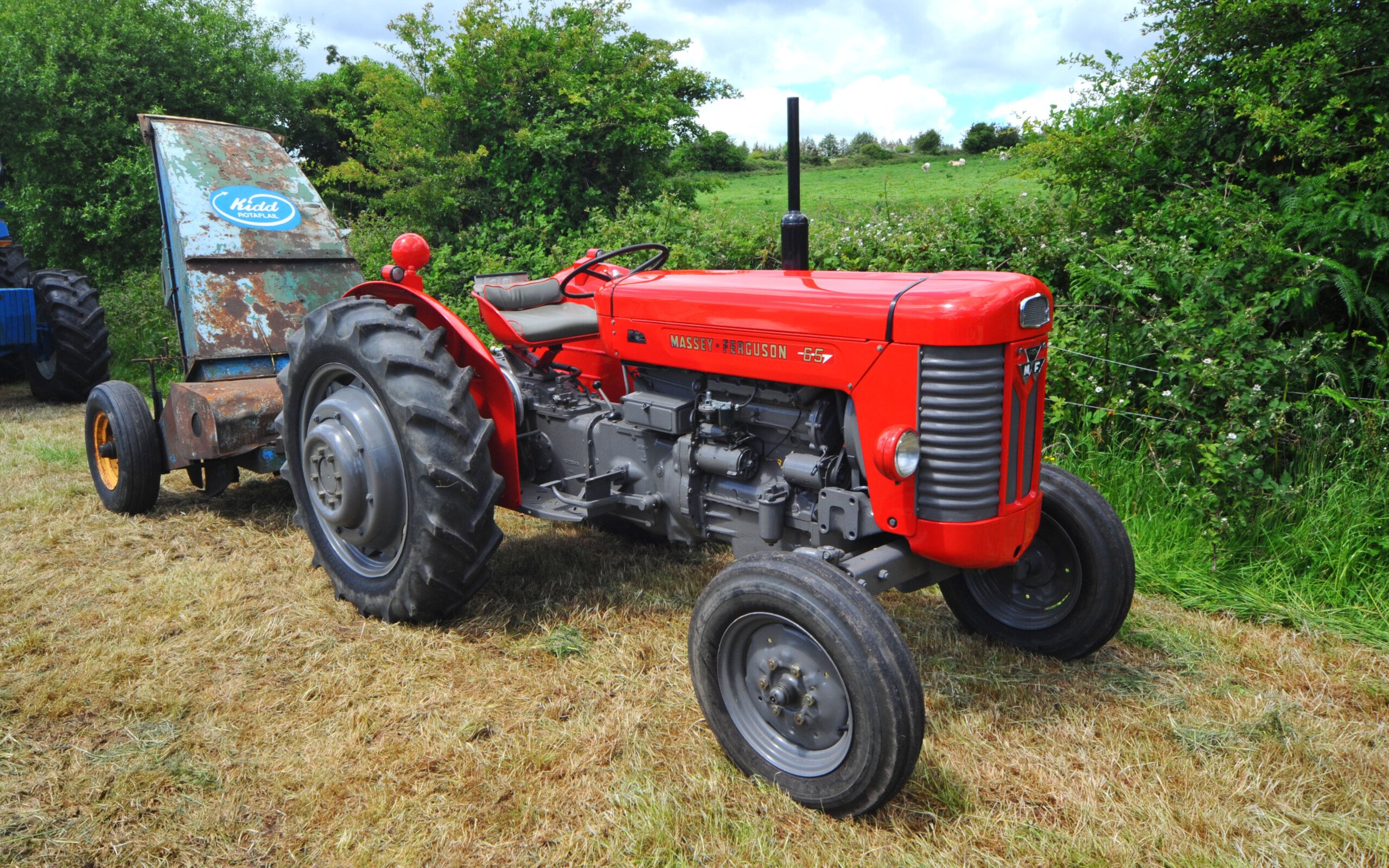 At 45hp the Massey Ferguson 65 didn't have the power of the DB 990, but it had a company focussed on agricultural machinery behind i;. Massey Ferguson is still with us