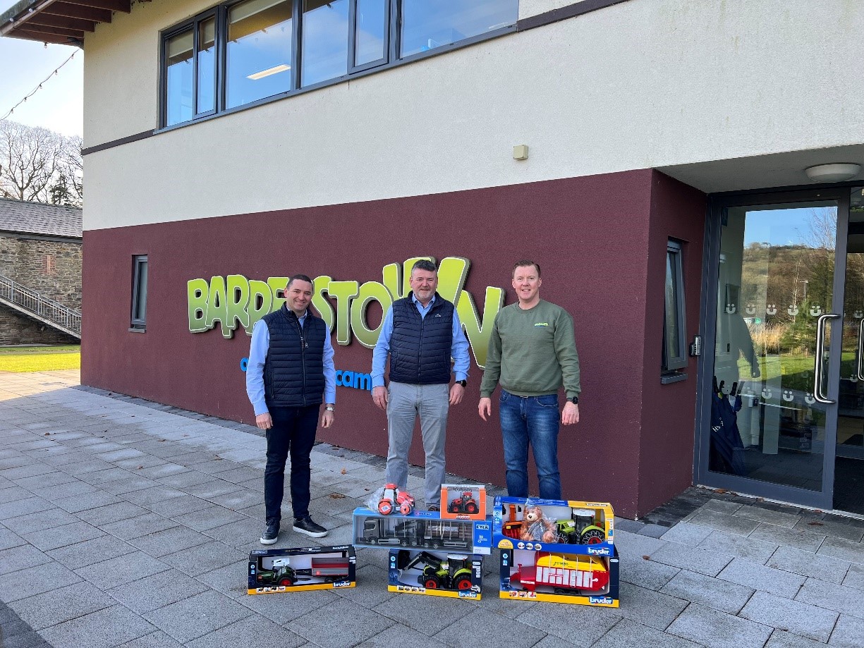 FTMTA president Diarmuid Claridge and FTMTA executive director, Michael Farrelly delivering the toys to Barretstown.