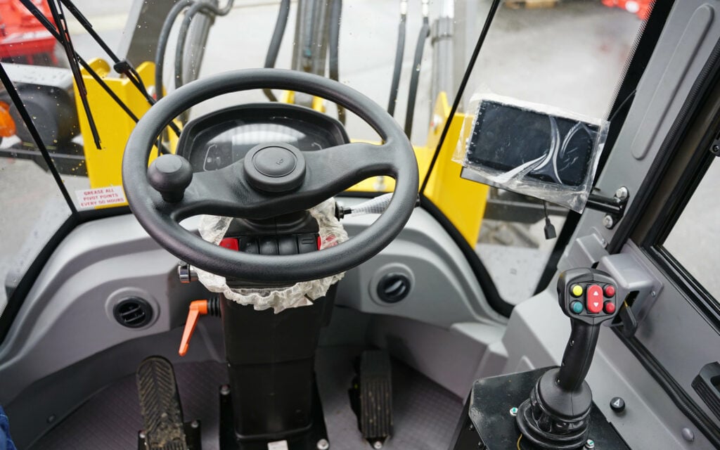 Few frills inside the cab, making it ideal for wet mucky yards