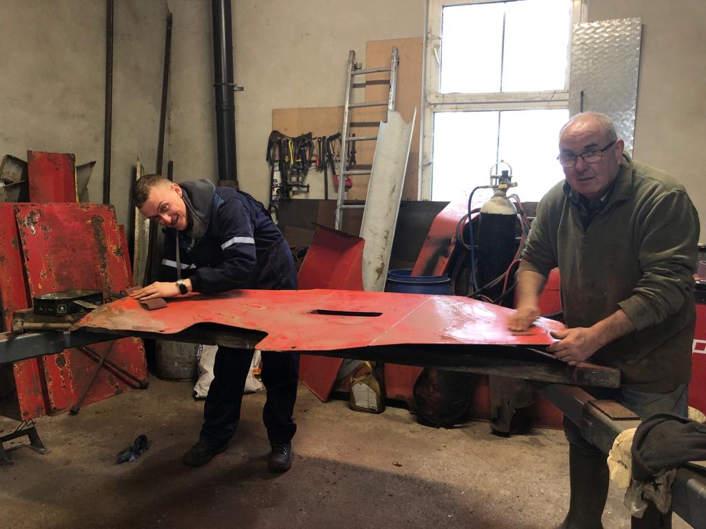 Cathal and Christy working on machinery in Foilmore. Image: KSF