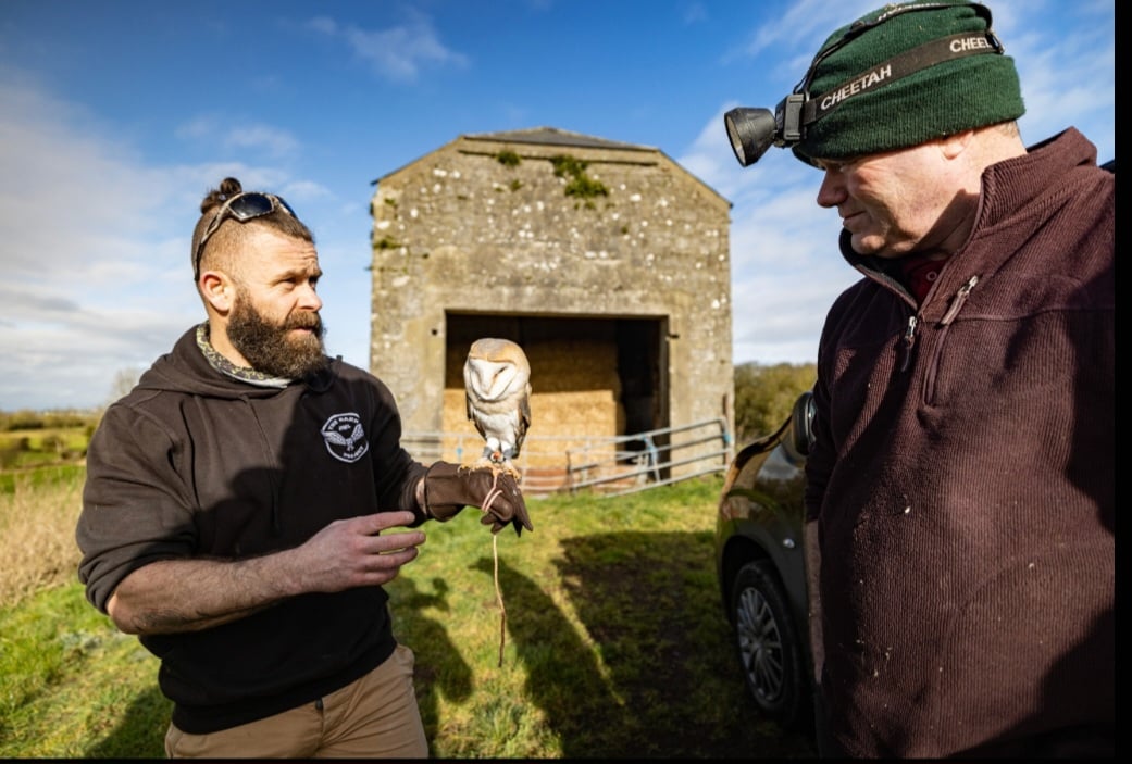 John Carrig with Erin the barn owl and John Holton, farm manager, Irish Cement, Co. Limerick
