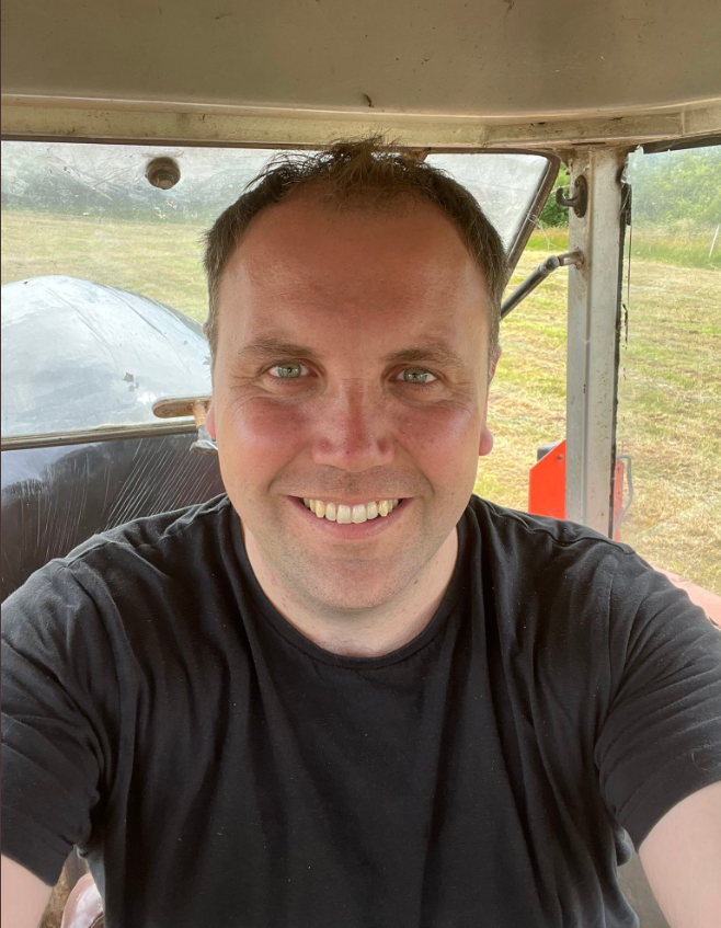 Fianna Fáil TD for Clare, Cathal Crowe during silage season 2022. Image: @CathalCroweTD