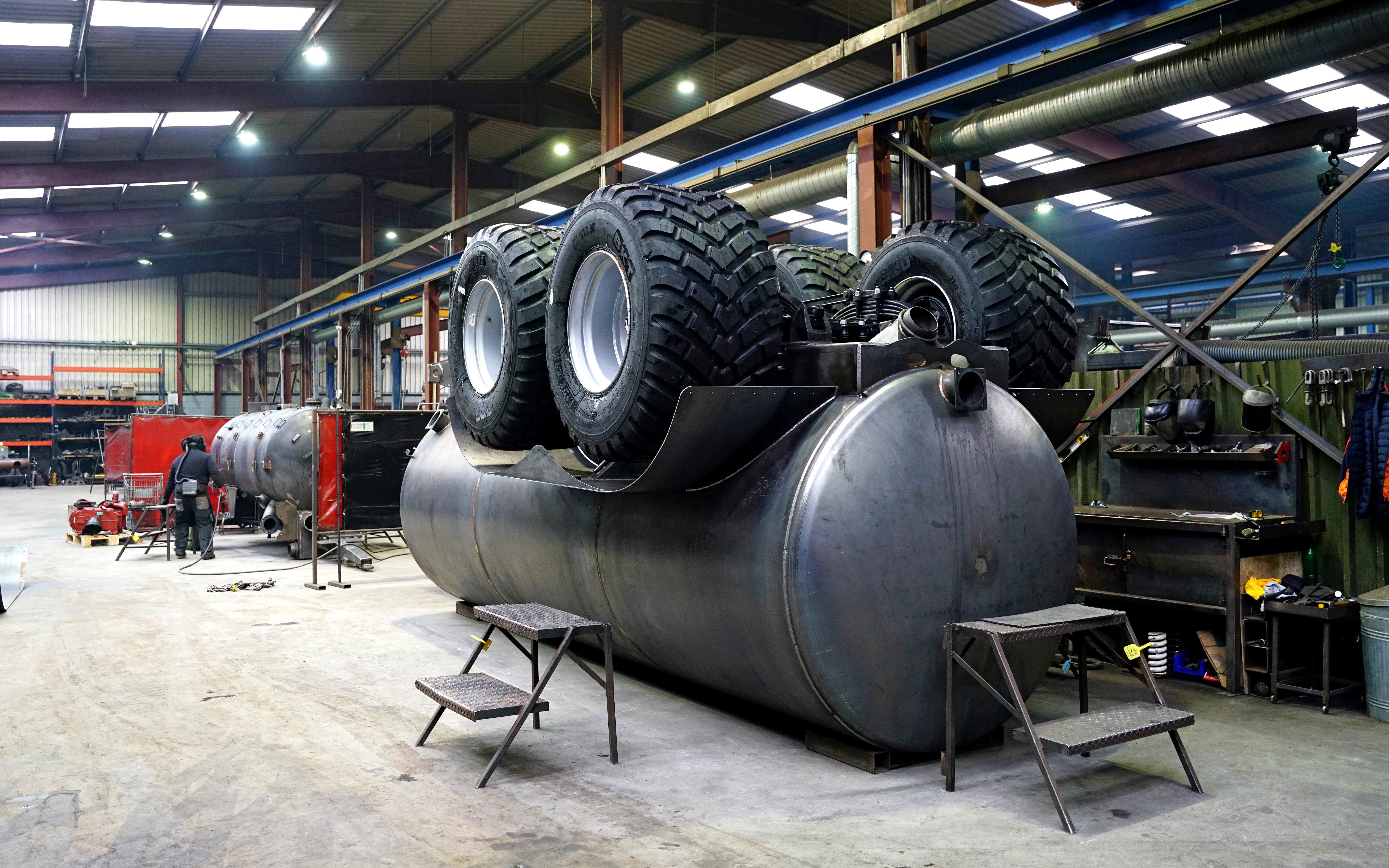 Once the tank is finished, it is turned upside and the chassis is then fitted from the top
