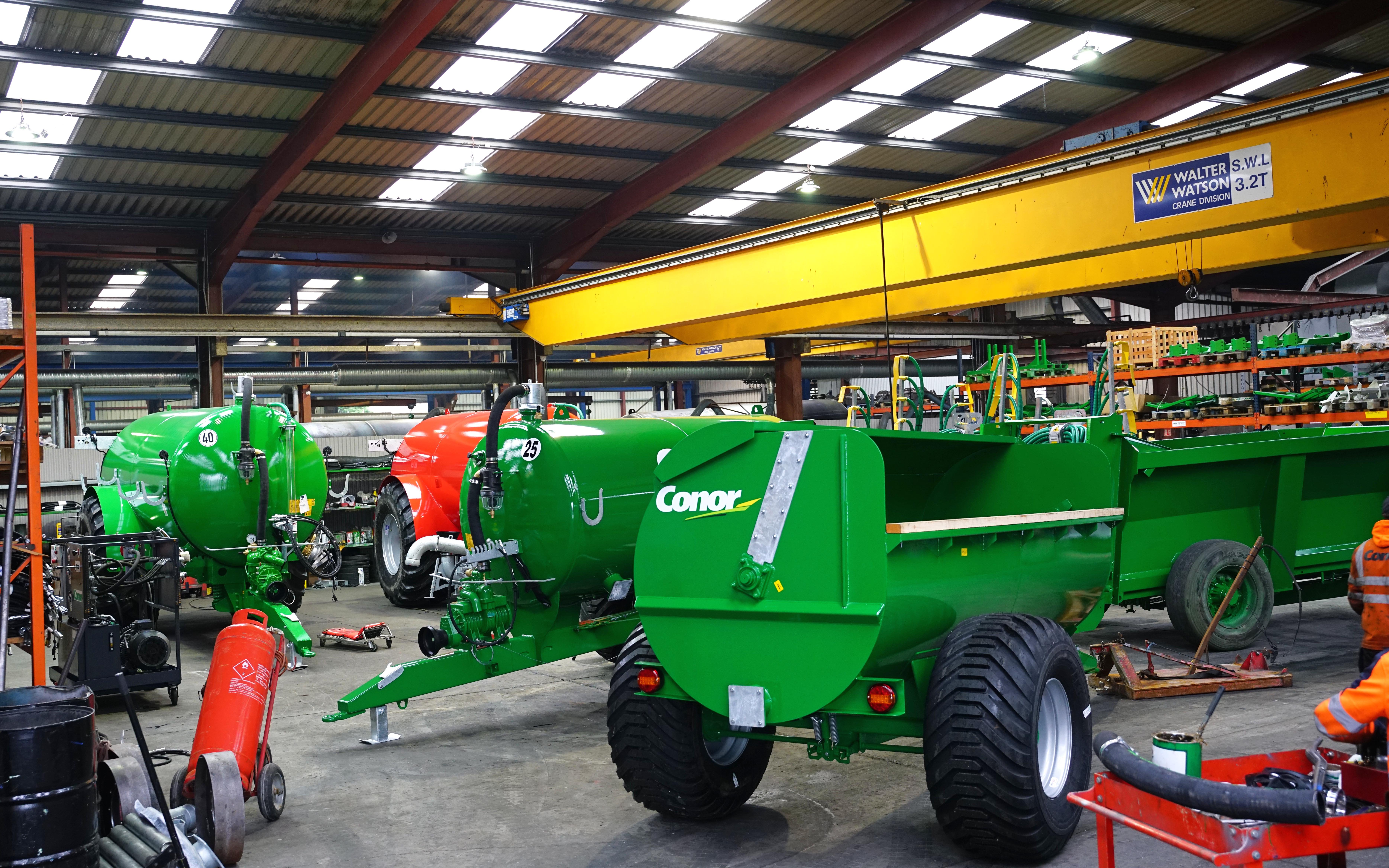 Final assembly is a busy area at Tubber. Machines are available in any colour, yet red and green remain the most popular