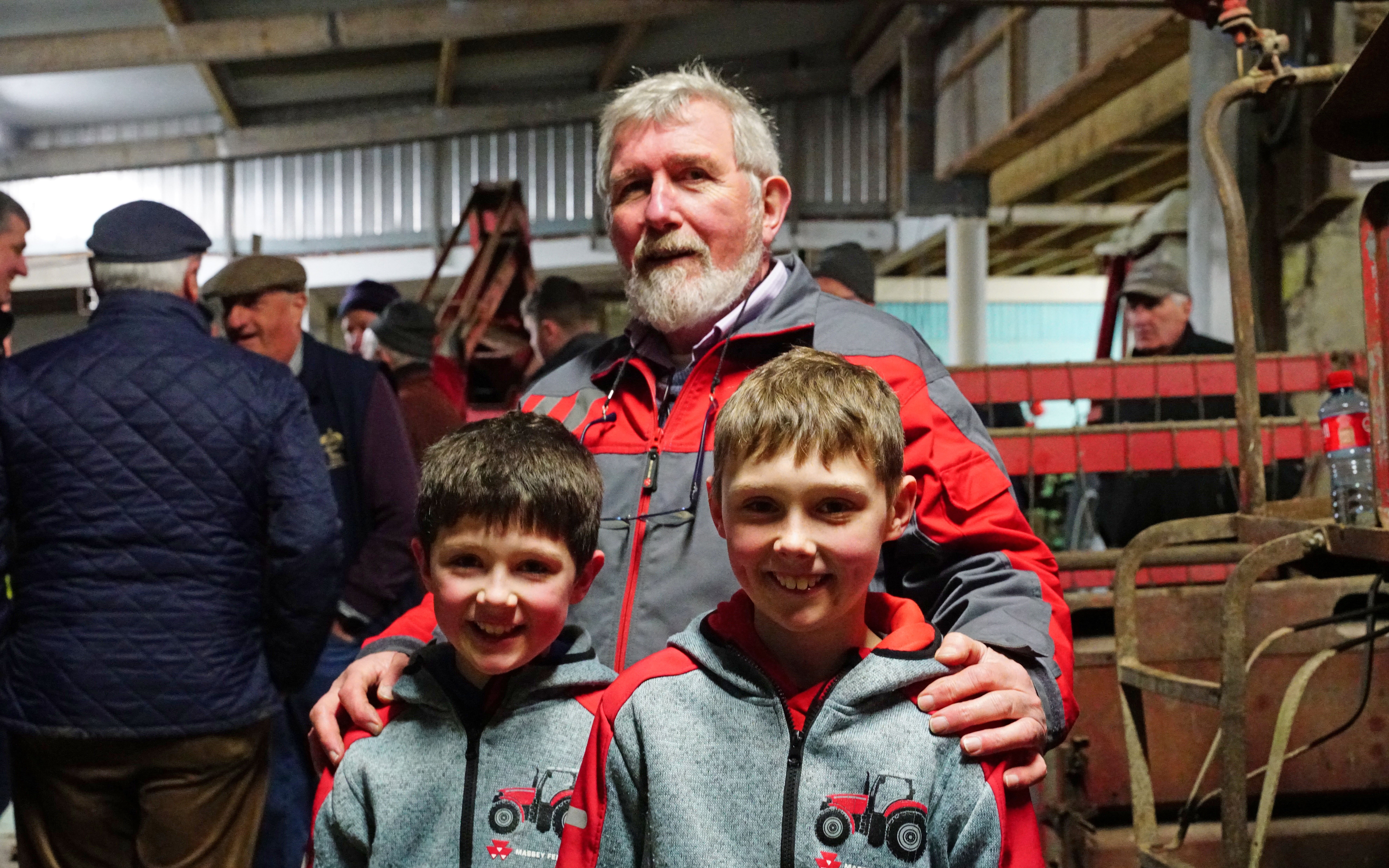 Michael Ford with two young enthusiasts, his grandsons, Billy and Jamie Cotter