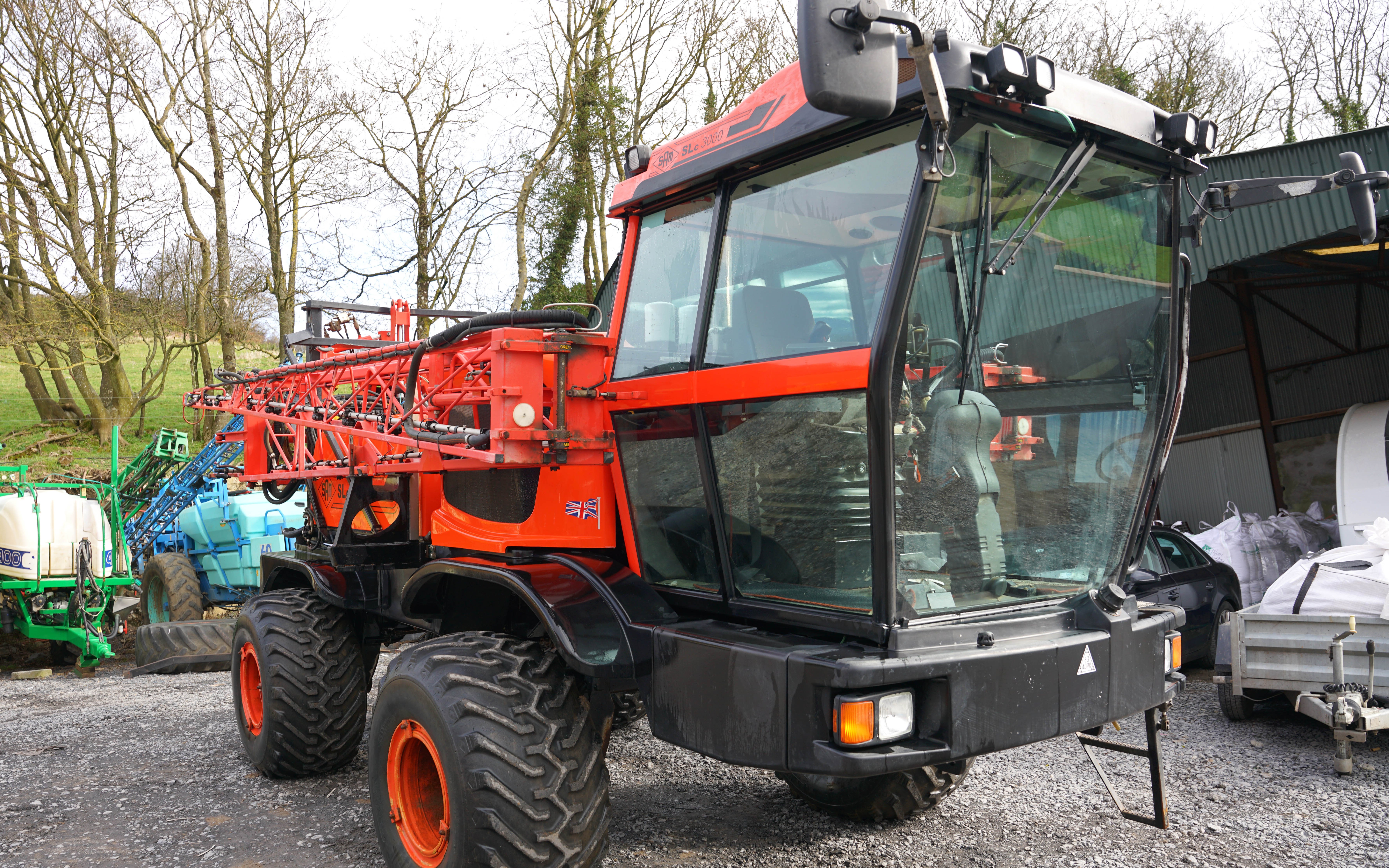 Forward cab and mid mounted engine balances the weight of the boom to provide equal weight distribution between the axles