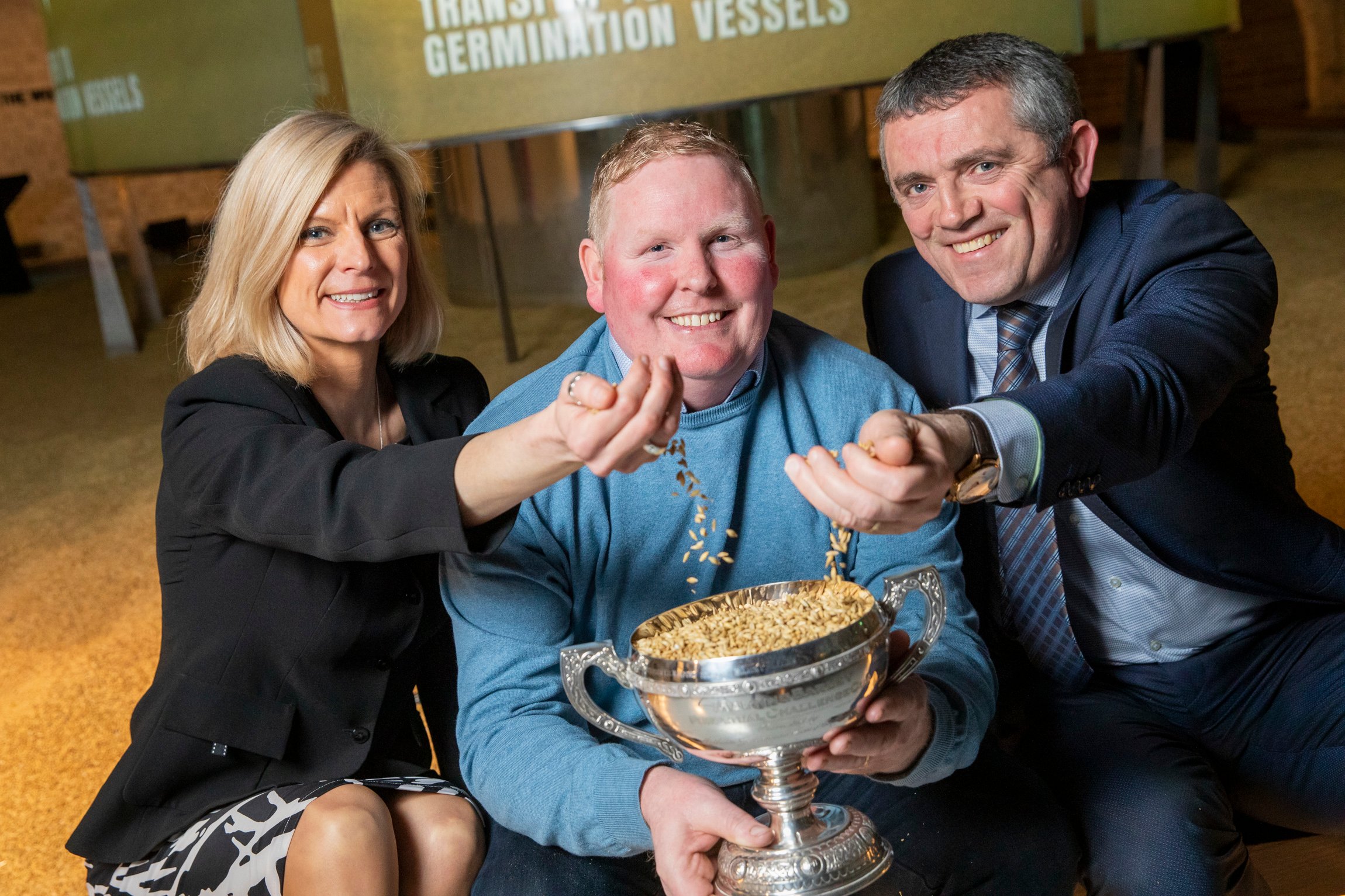 Pictured at The Guinness Storehouse, Dublin, with the Guinness Perpetual Cup are the winner of the Diageo/Boortmalt Malted Barley Awards 2022, Paul Delaney from Portalaoise; Minister for land use and biodiversity, Pippa Hackett; and Aidan Crowe, operations director, Diageo. Image: Naoise Culhane