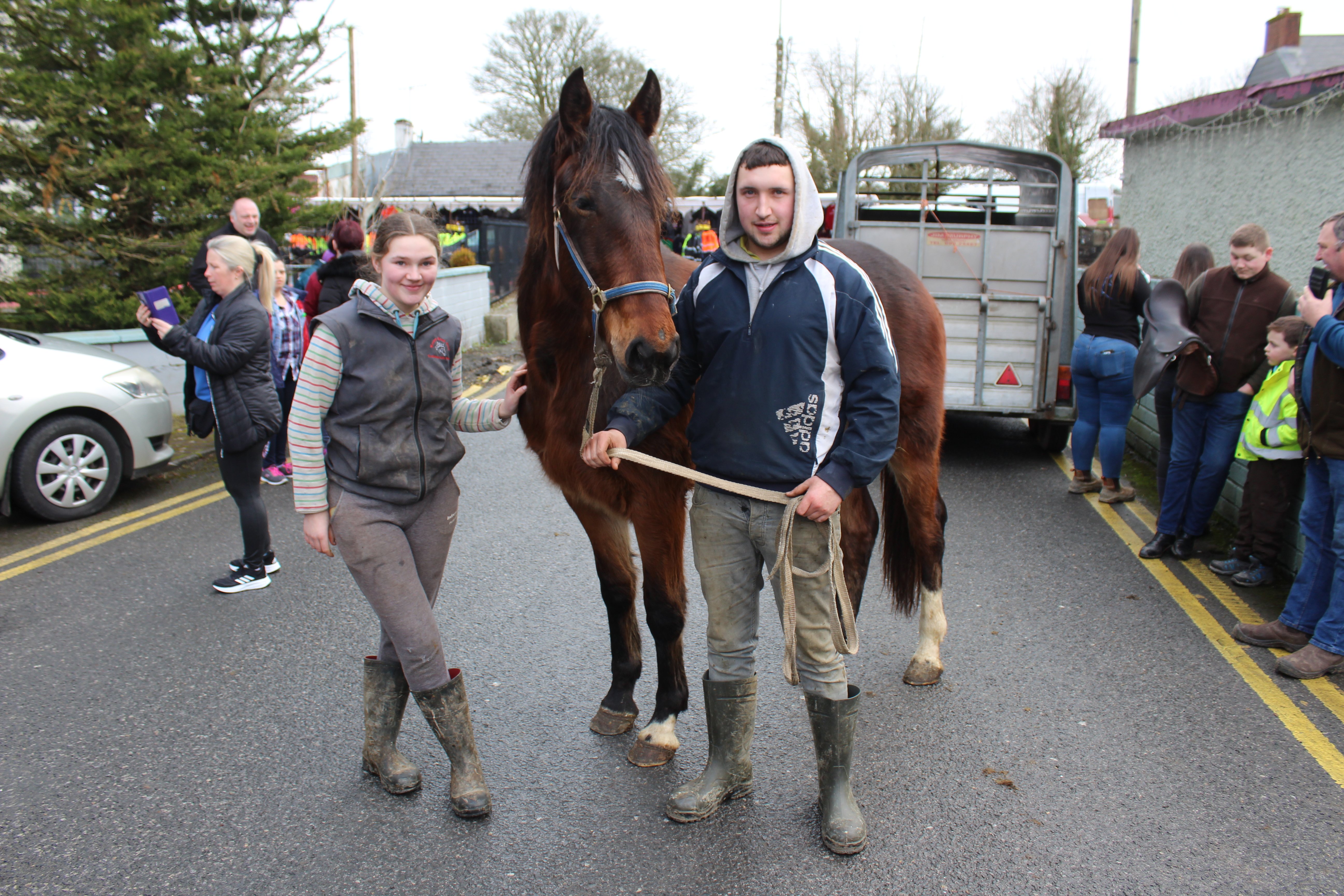 Caoimhe and Cathal Shine, from Meelin, Co. Cork, with their 18-month old Irish draught filly, ready for the sale at Newmarket