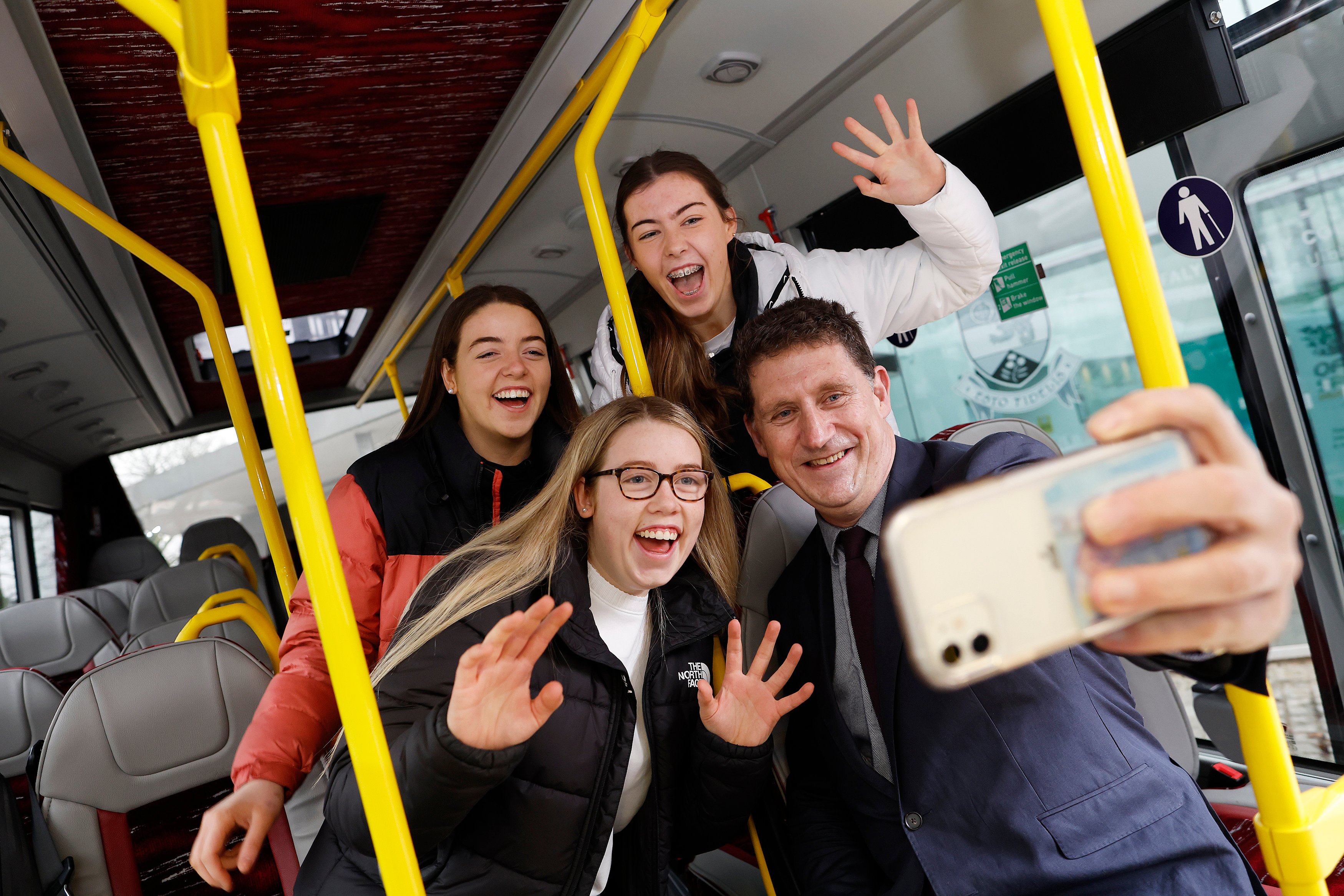 Pictured getting a selfie onboard the TFI Local Link bus in Tullamore was Minister Ryan and local students Jane Maher, Chloe Smyth and Emma Gillespie. Image: Julien Behal Photography