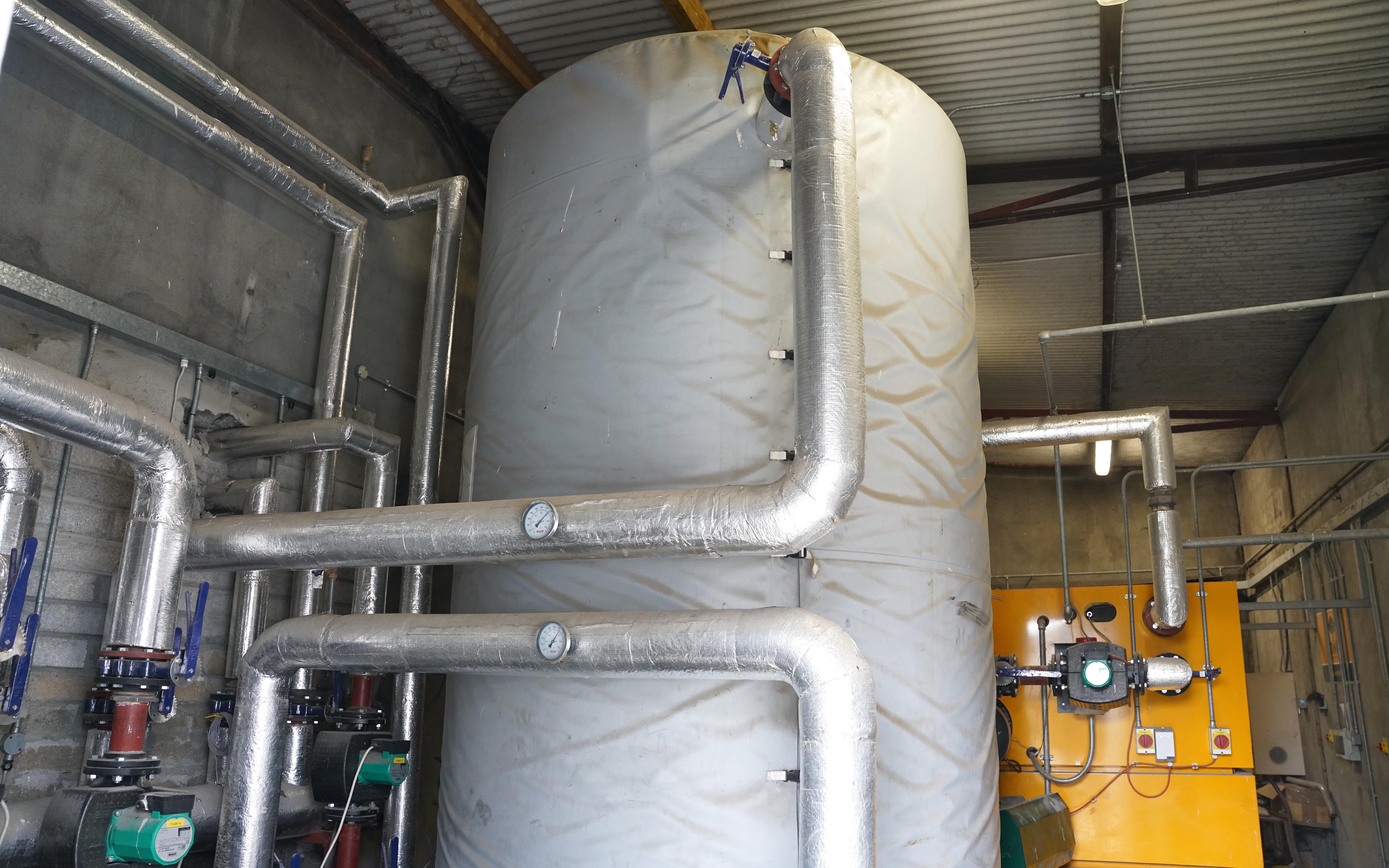 At the heart of the heating system lies the boilers and hot water reservoir