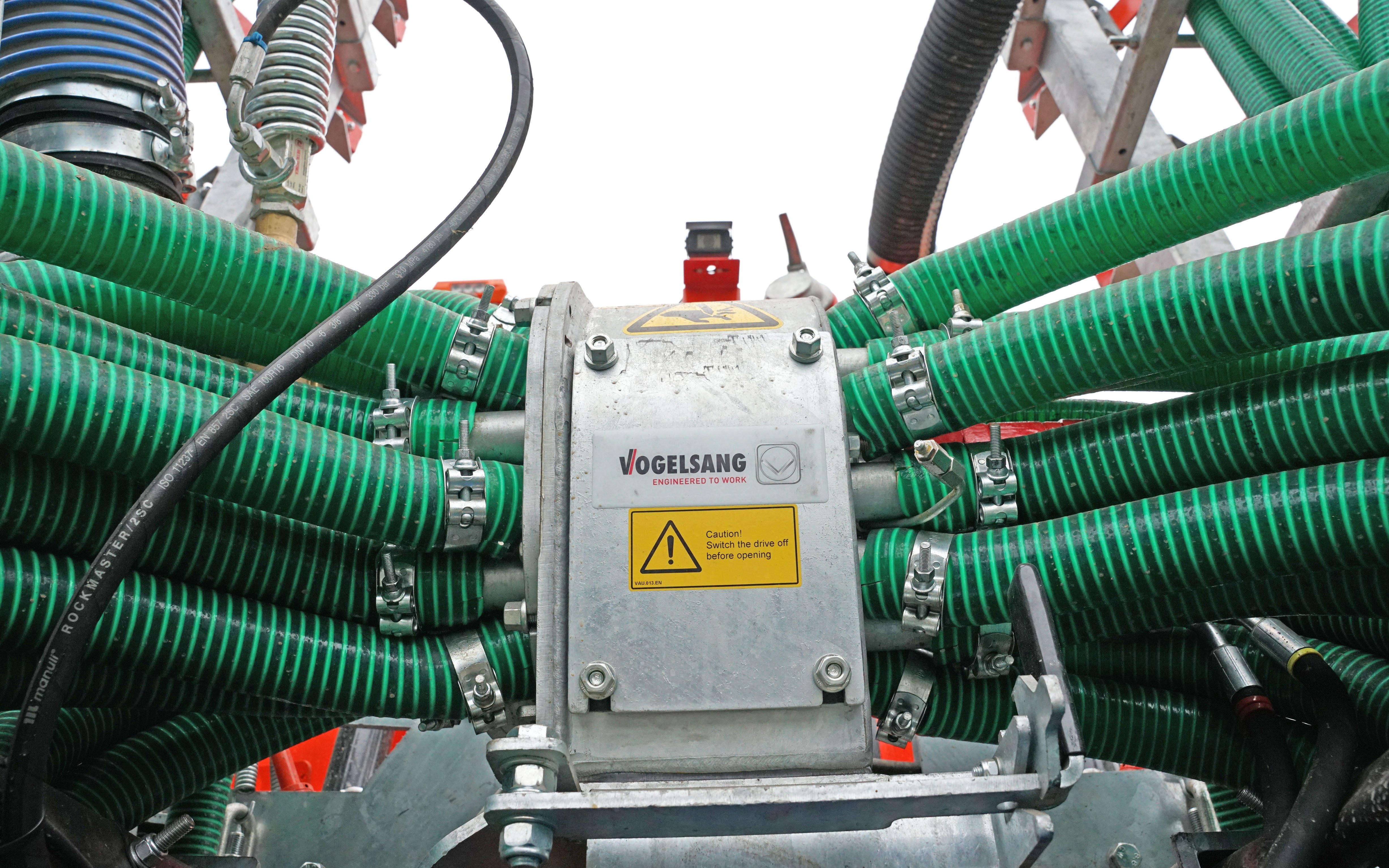 To prevent blockage, a trailing shoe system may require an additional macerator on the intake rather than relying on the distribution head
