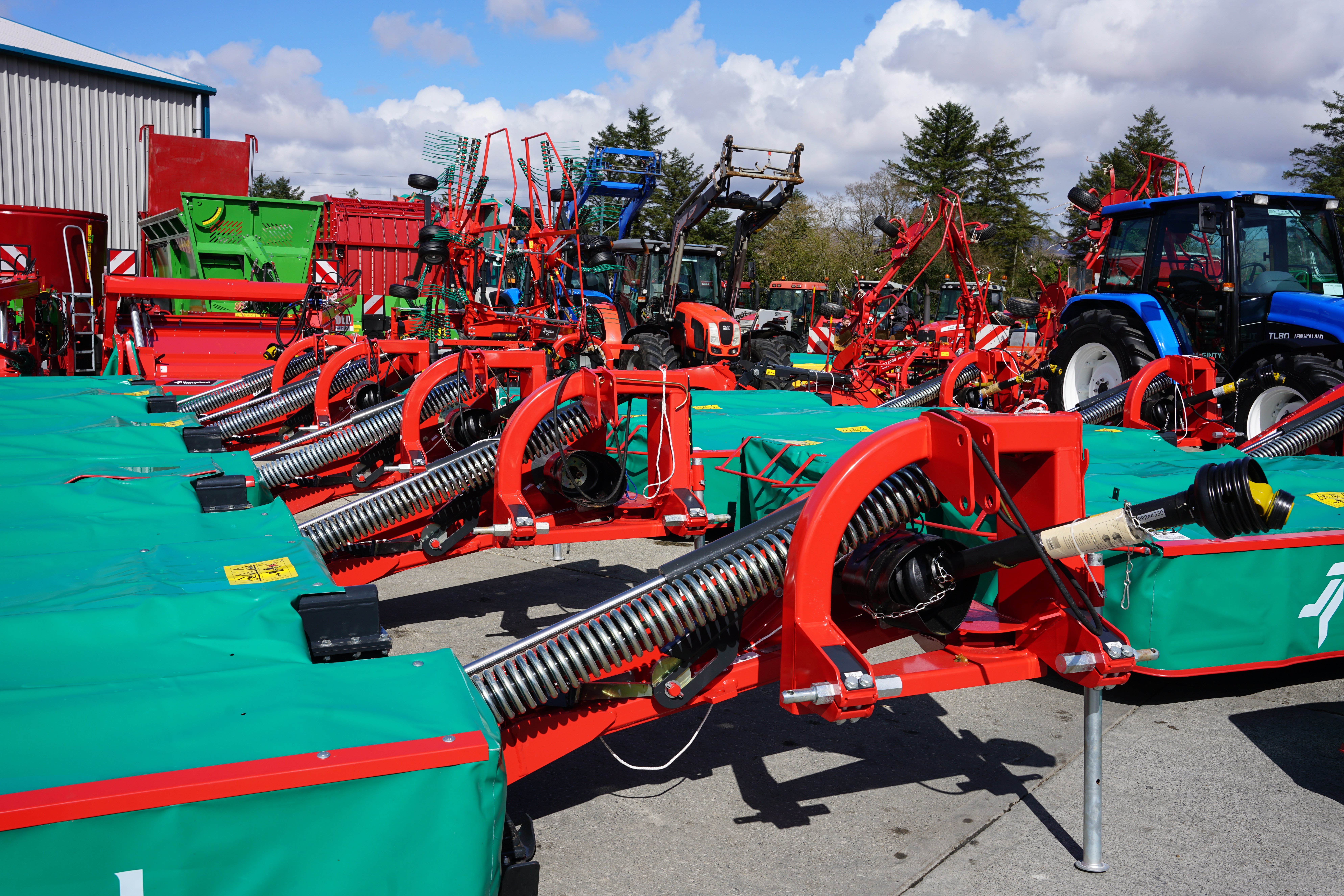 Kverneland mowers ready for despatch in a yard with just about everything and anything required for the season