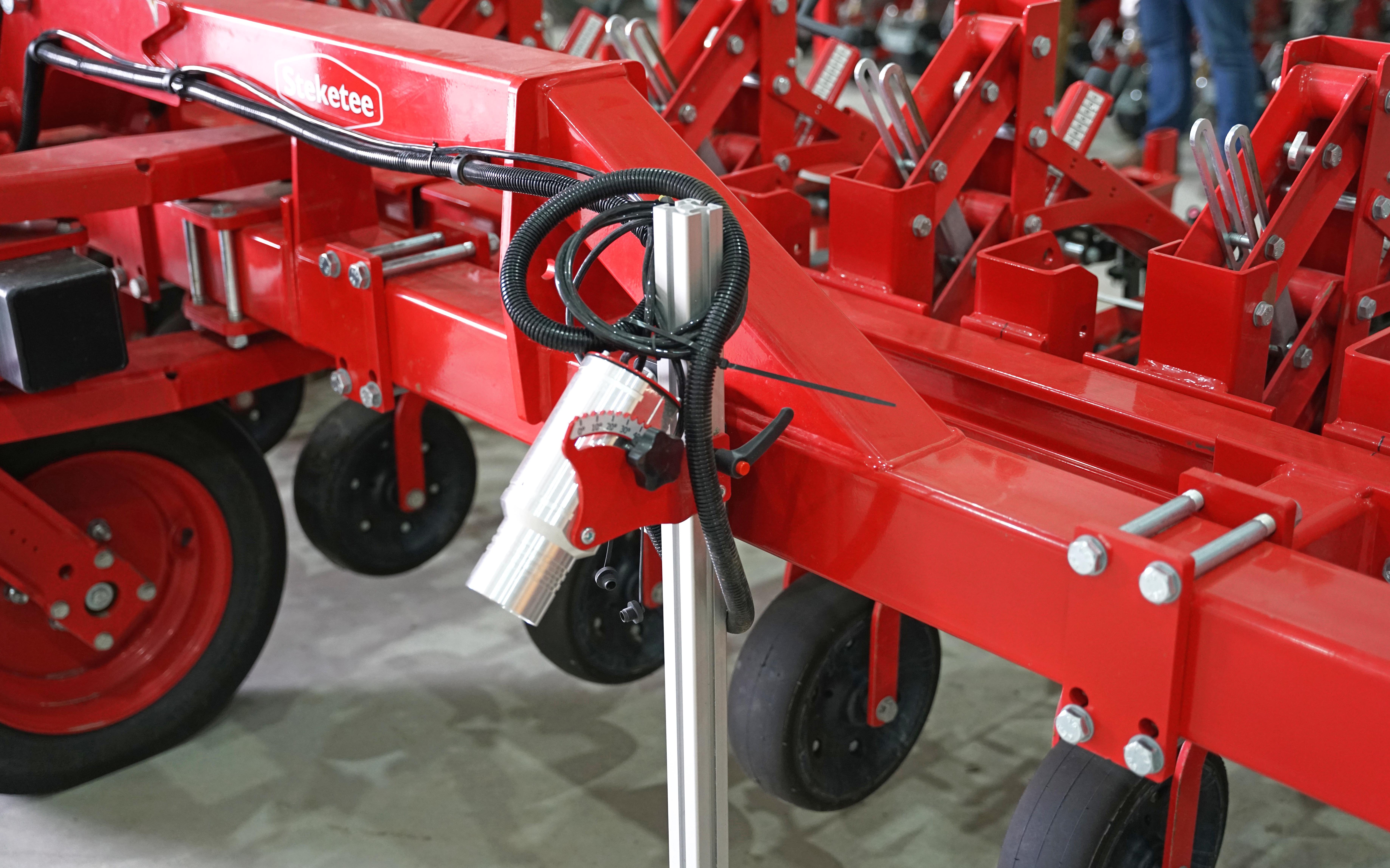 A camera can guide the machine down rows, but it helps if they are straight and regular
