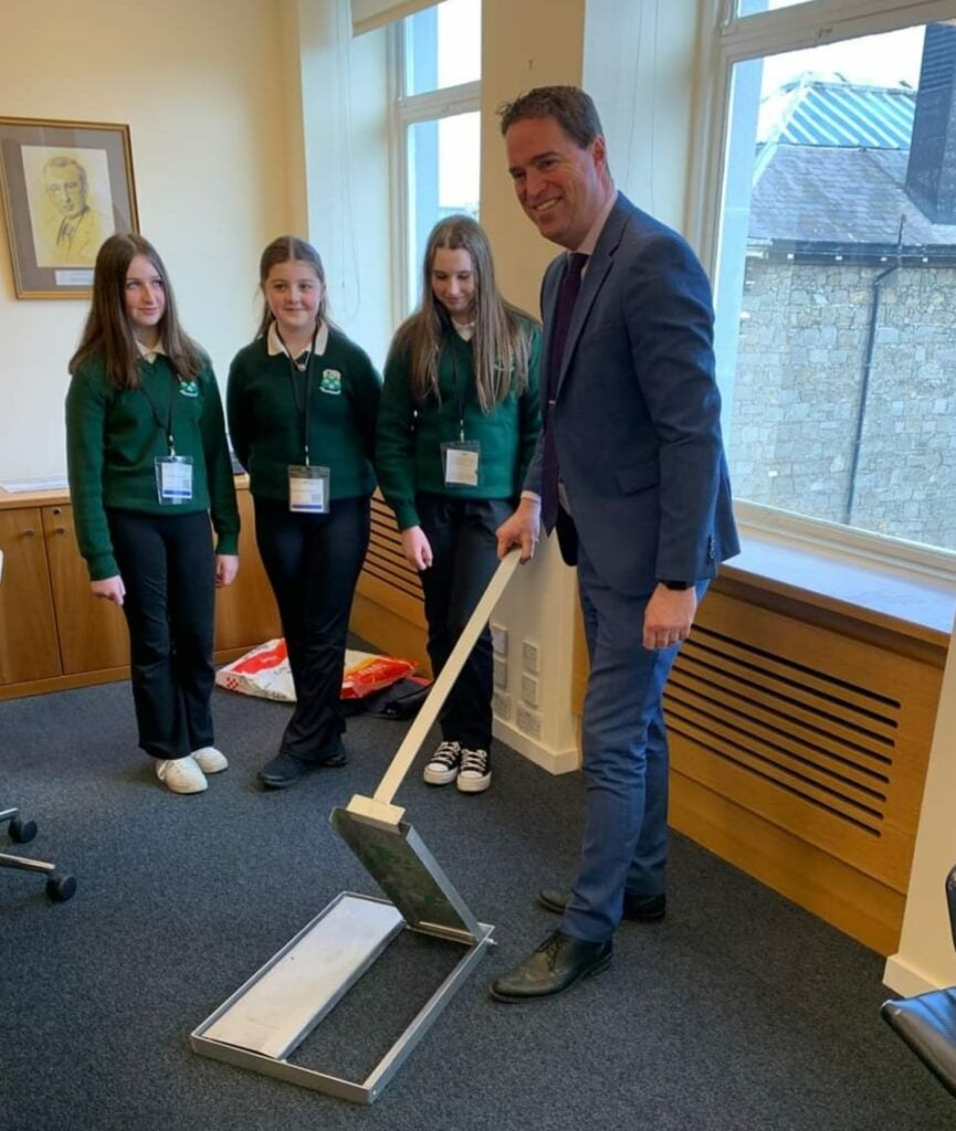 The winning trio with Minister Martin Heydon in Leinster House.