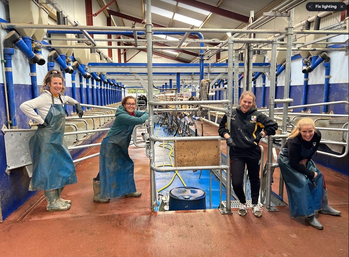 The bridesmaids helped out with milking after the hen party