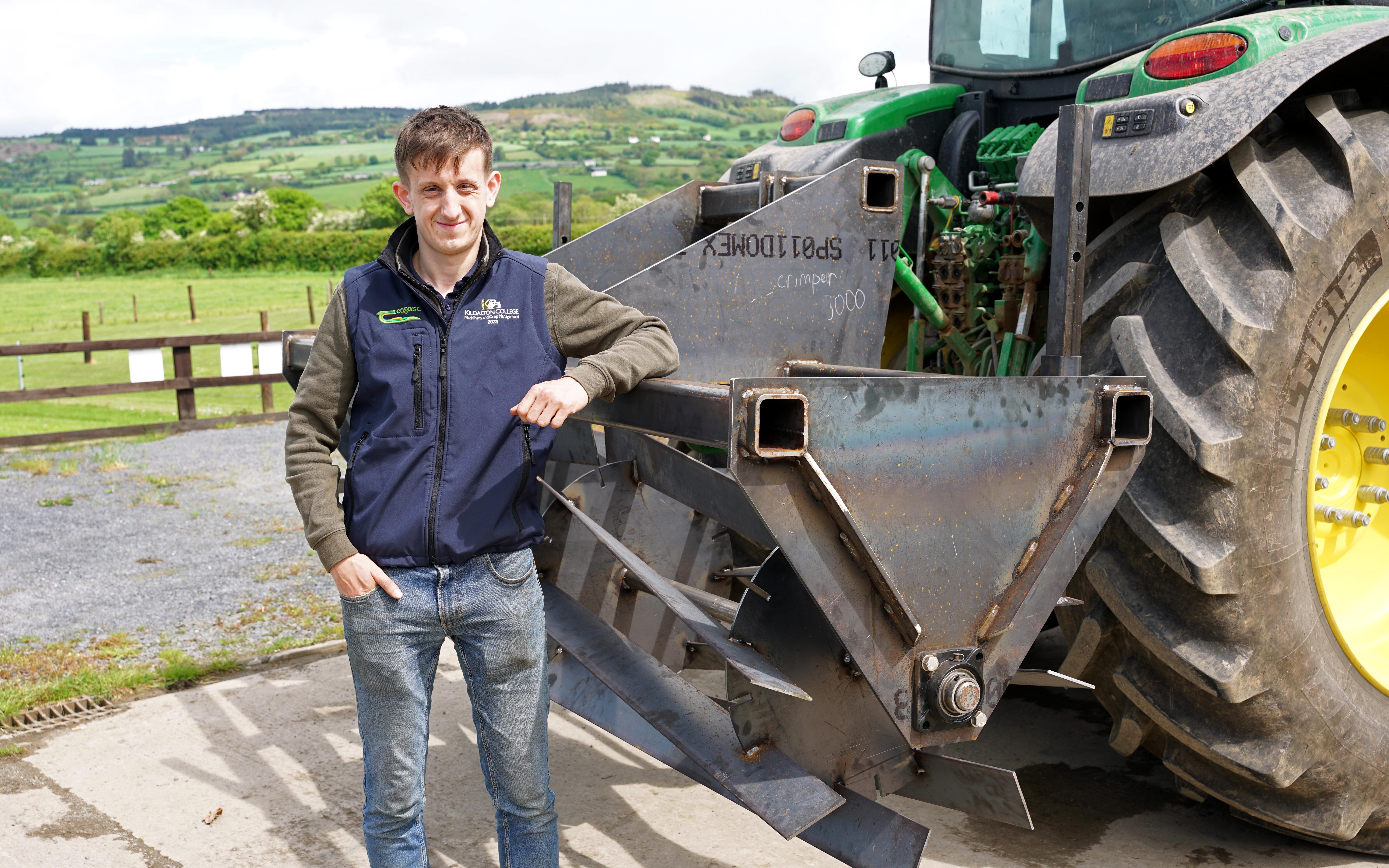 Evan Jacobs of Wexford with his Crimper 3000, designed to breakdown cover crops in the field