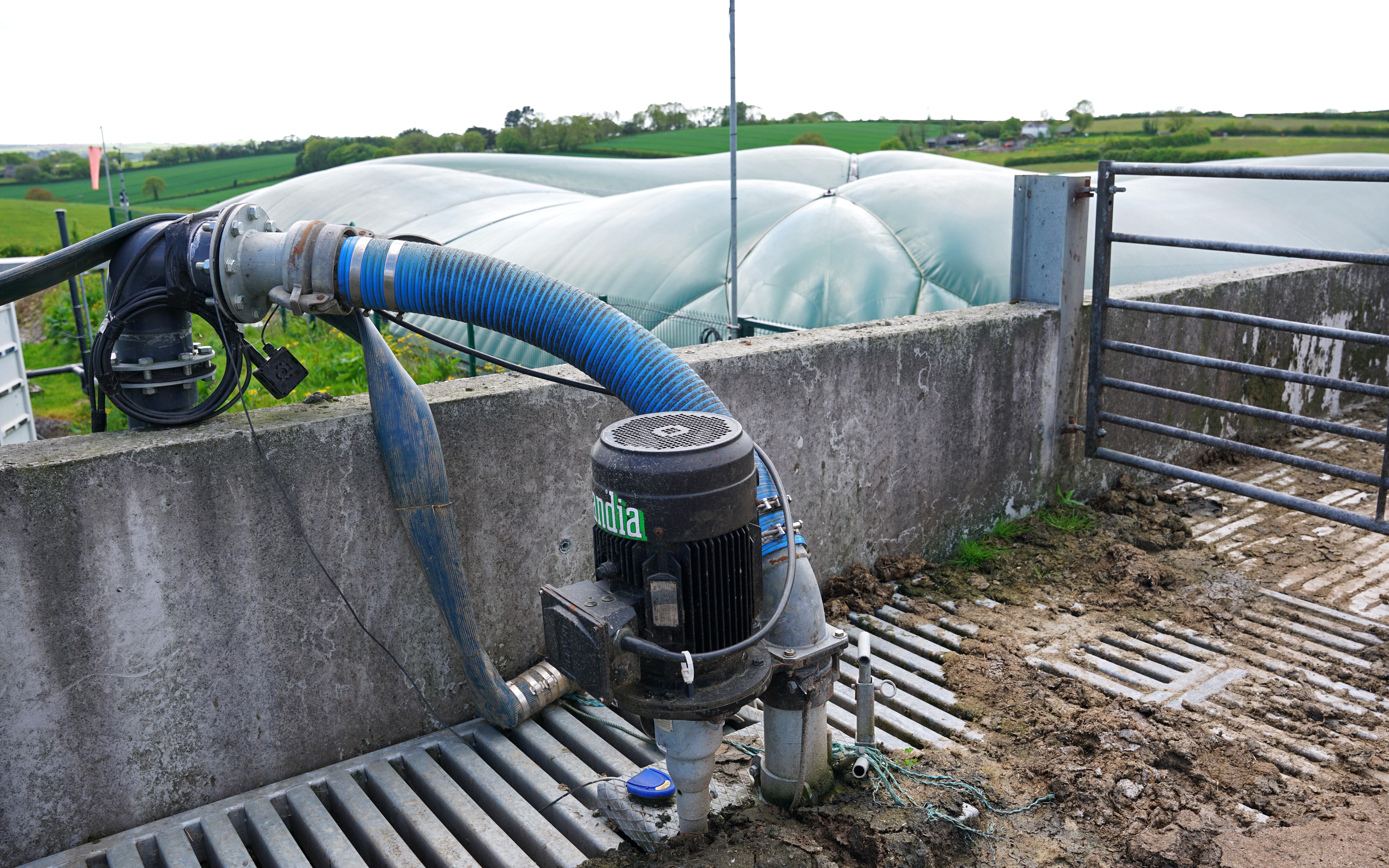The slurry is pumped from the reception pit and injected into the covered lagoon