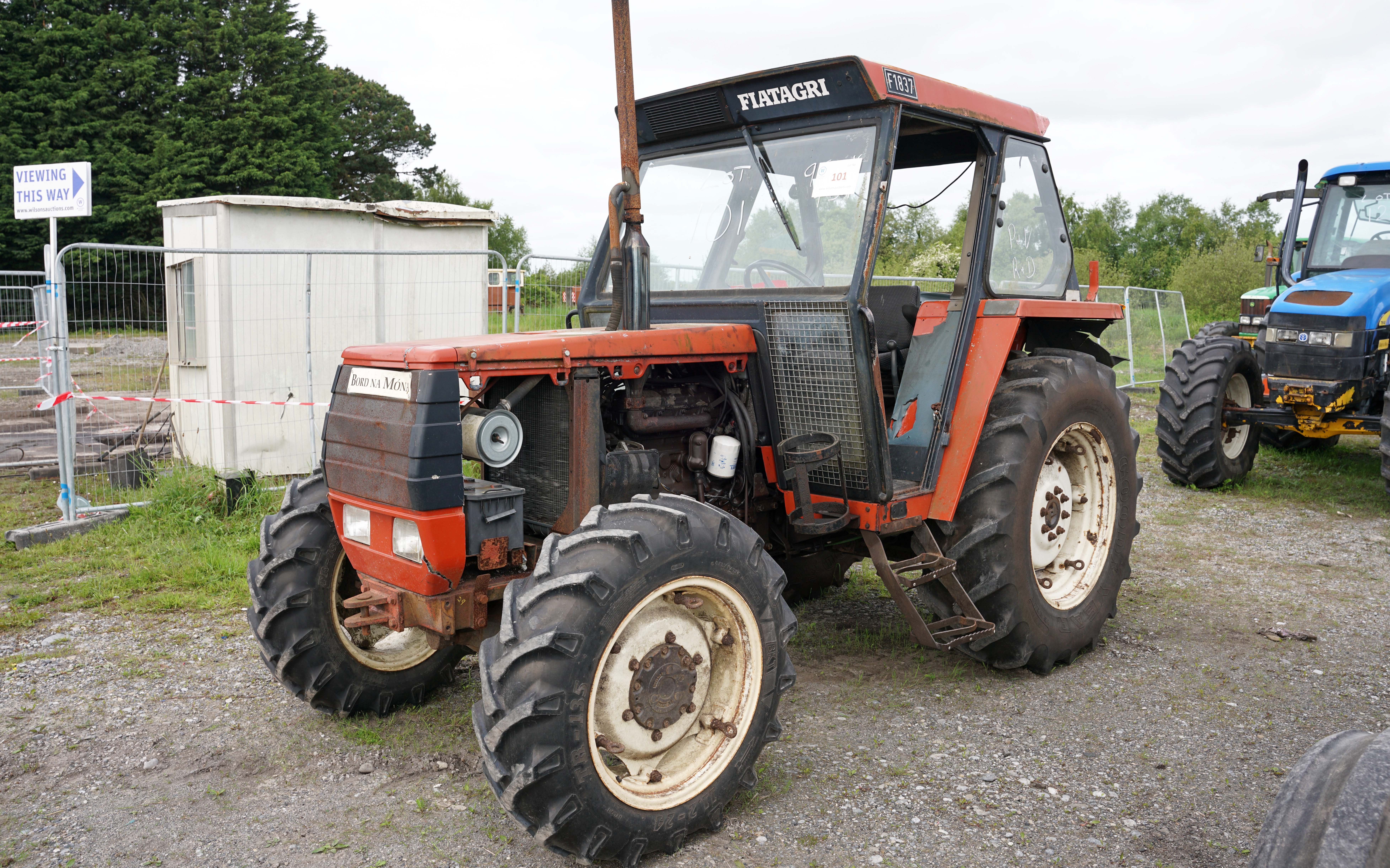 An interloper in the shape of this Fiatagri 65-94 breaks the ranks of green red and blue