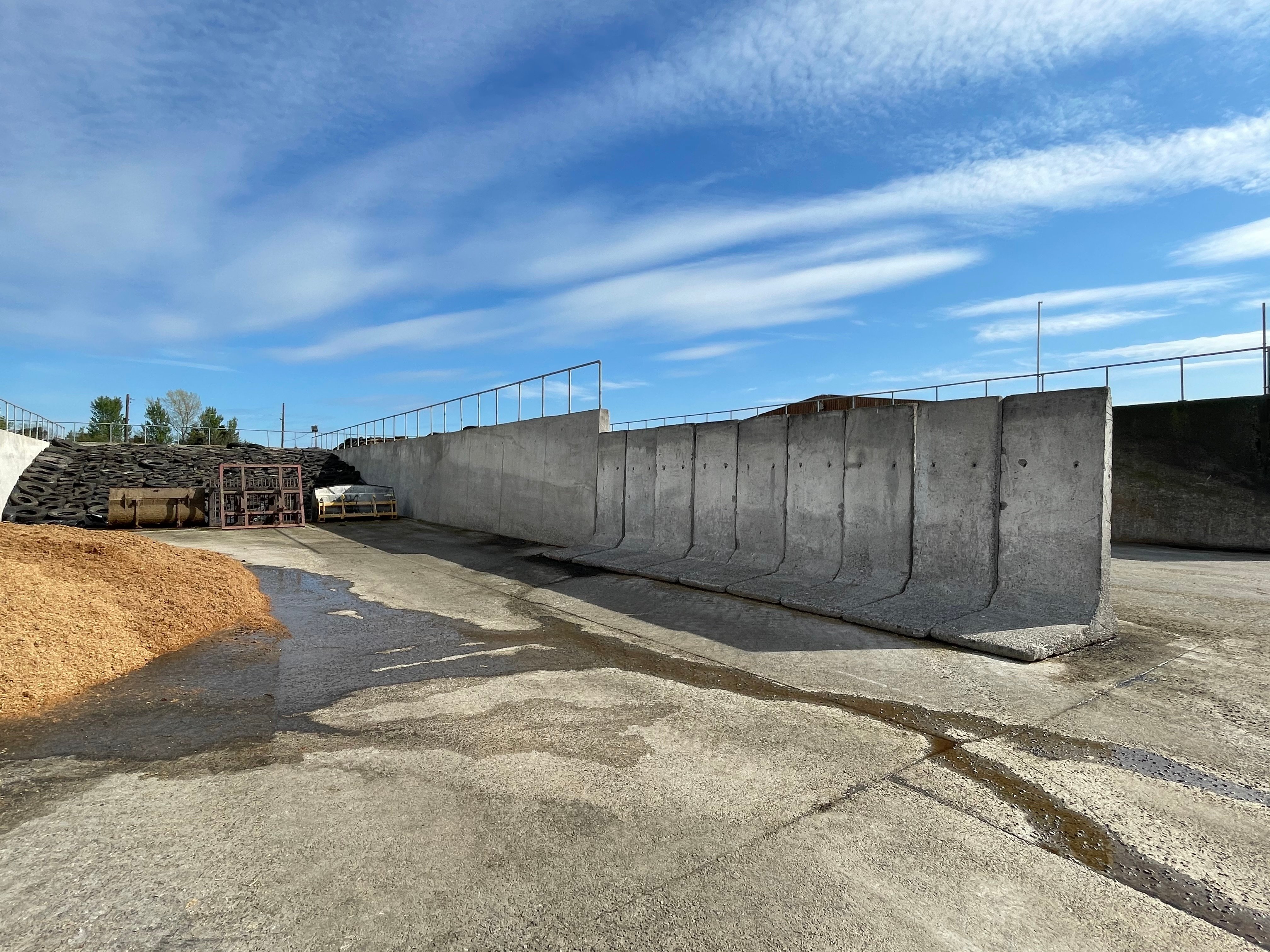 2023 first-cut silage at back of pit and brewers grain to left