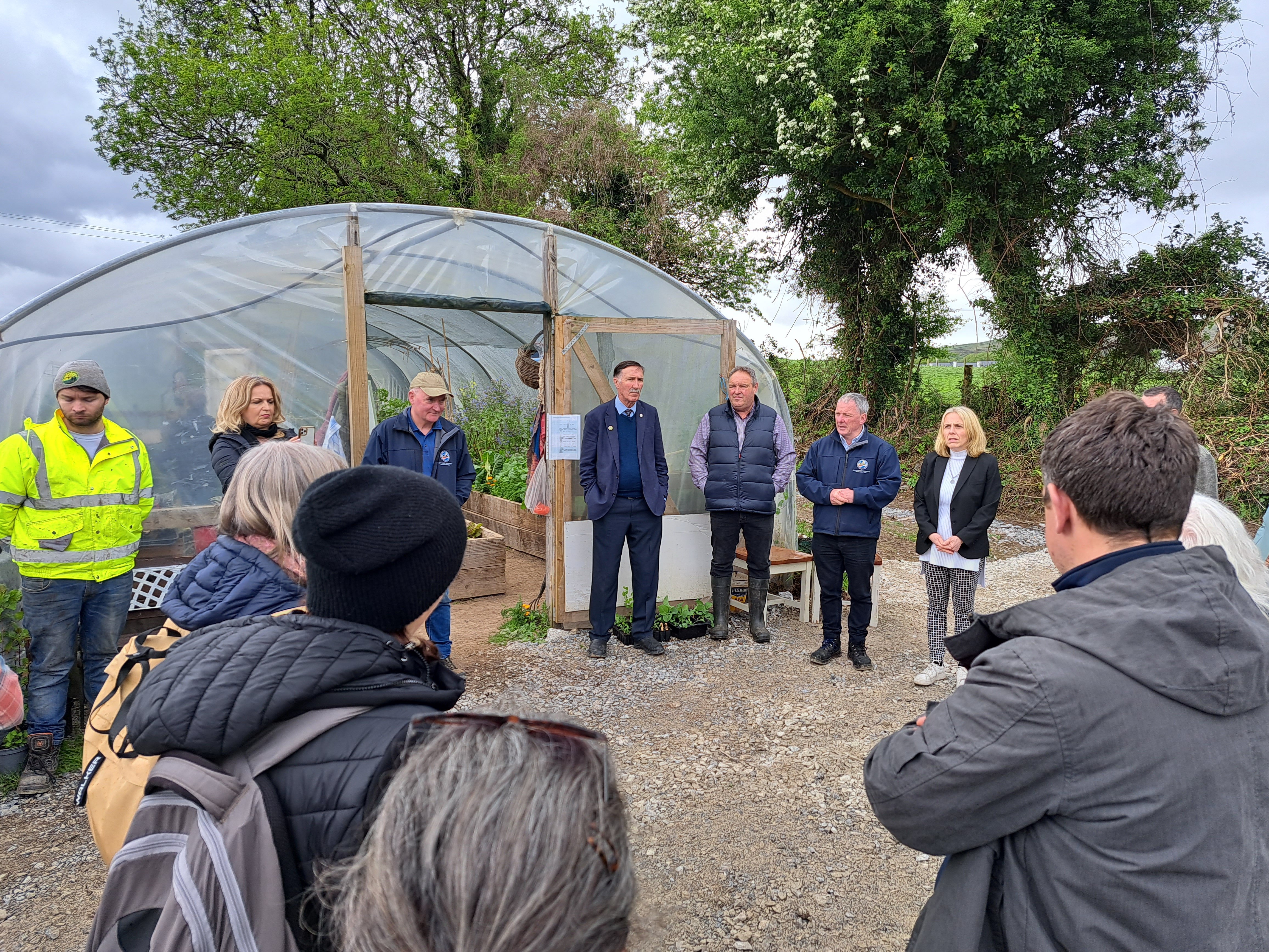 Joseph McCrohan (South Kerry Development Partnership), with Tanya O’Sullivan (Taobh Linn), Eamon Horgan (chair of Kerry Social Farming Working Group) and Tony Donnelly (chair of South Kerry Development Partnership) welcoming the FarmElder group to Kenmare Community Garden Image: SKDP