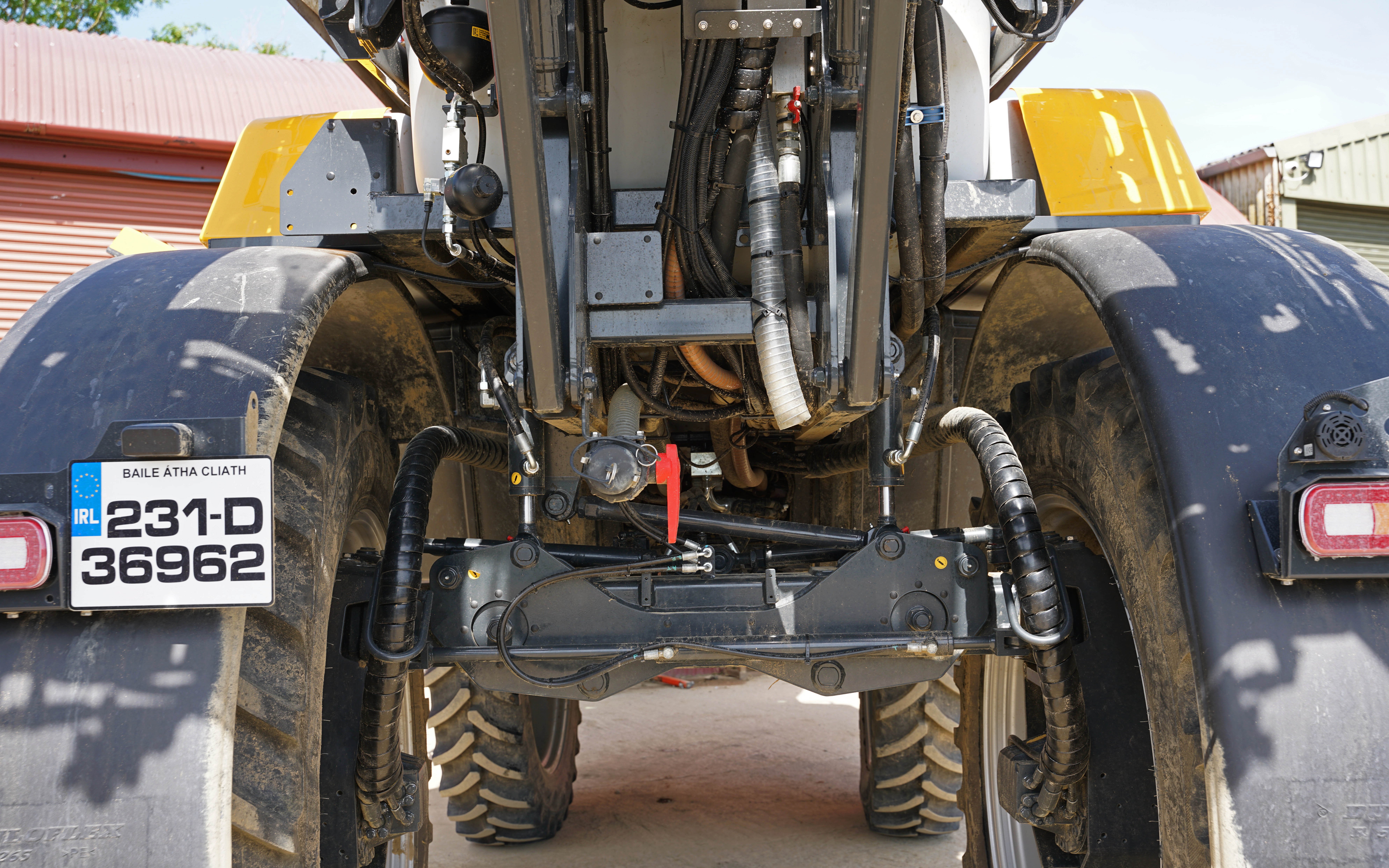 Suspension is provided by six pneumatic accumulators and the track width is hydraulically adjustable