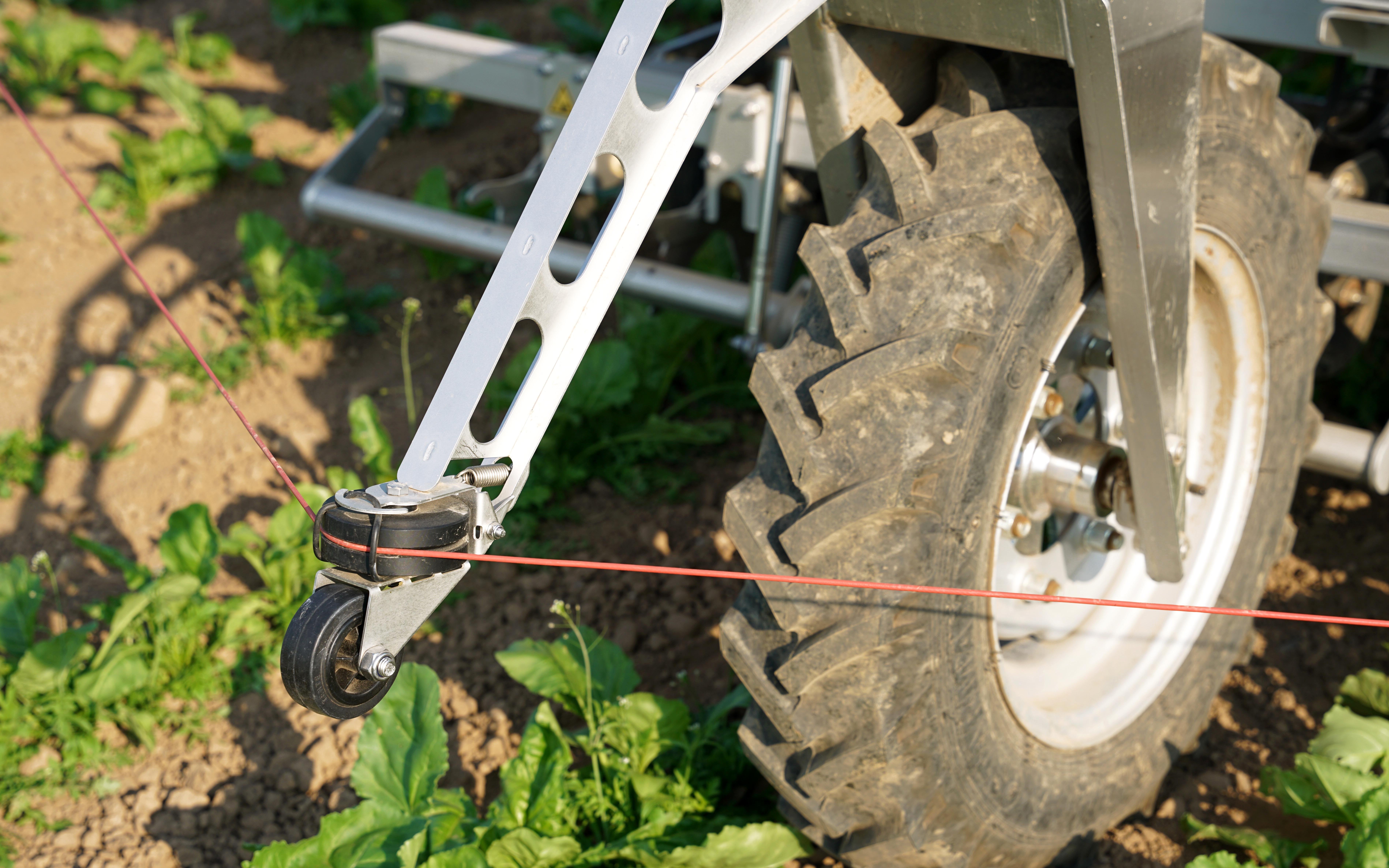 A trip wire runs around the base of the machine which stops it should it encounter an object or person