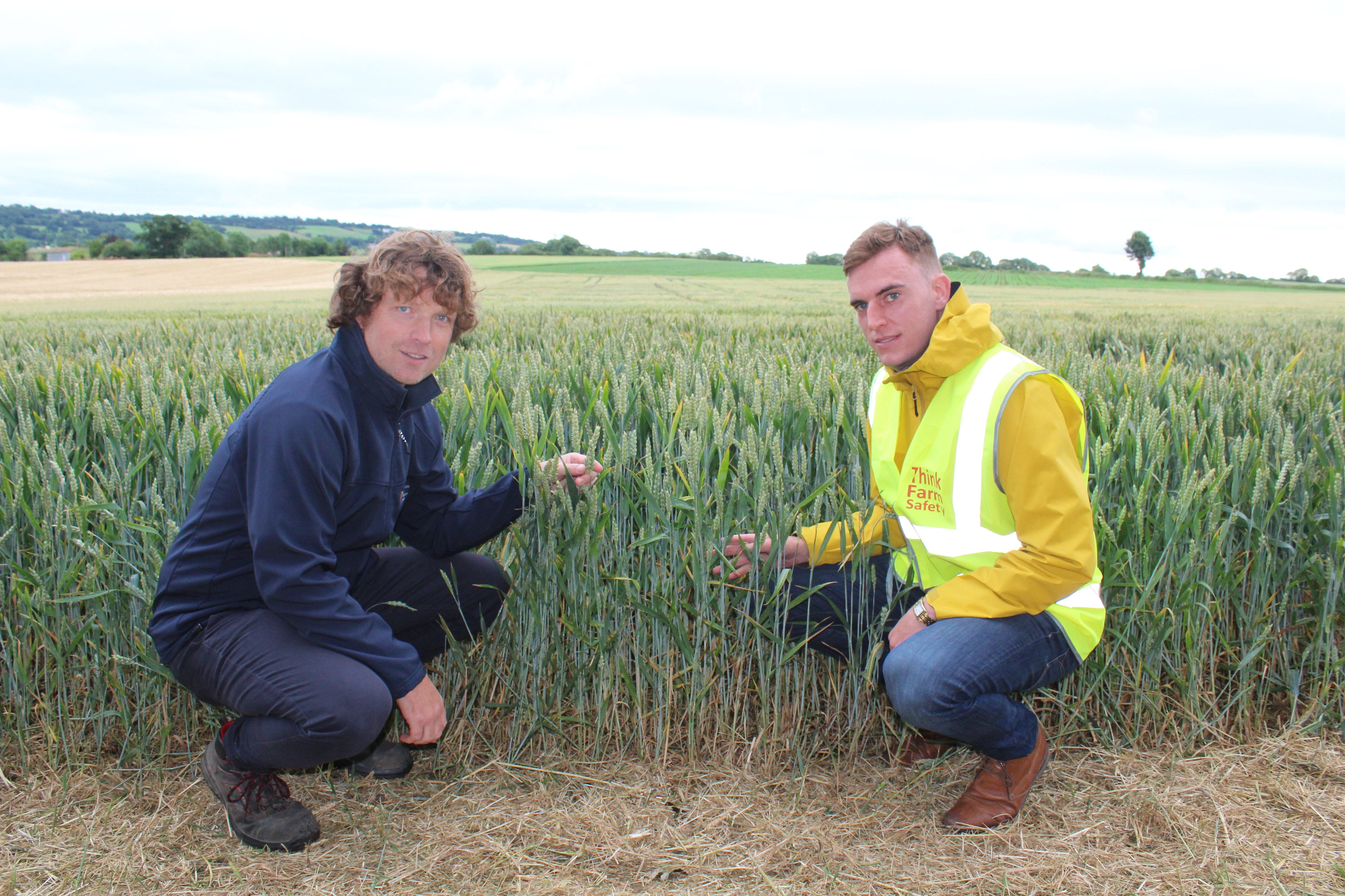 Discussing the wheat trials at Kildalton (L-R): DAFM's Seamus Kearney and Alan Hurley