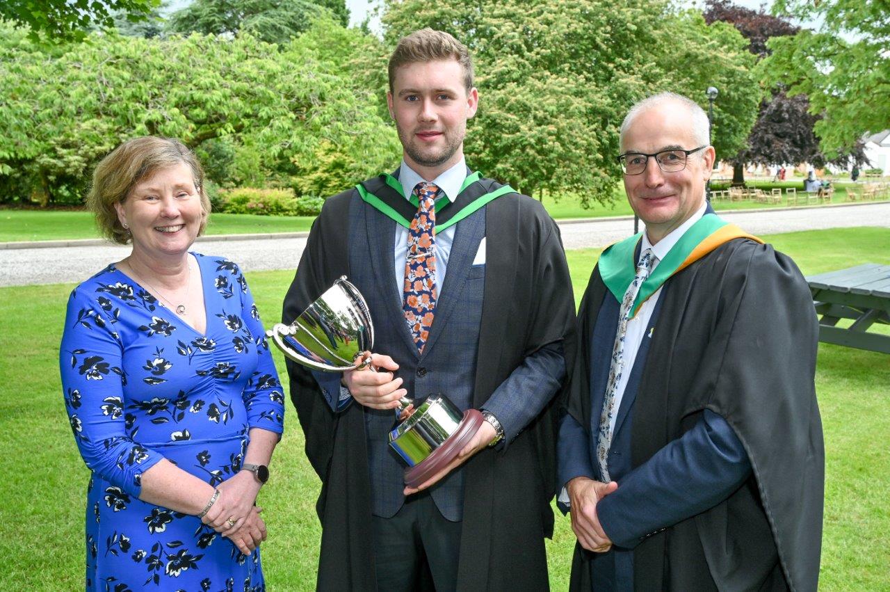 William Hendry (Richhill) received the DAERA prize for top student on the BSc (Hons) Degree in Sustainable Agriculture course from Katrina Godfrey, permanent secretary, DAERA and Martin McKendry, college director, CAFRE at the Greenmount graduation ceremony.