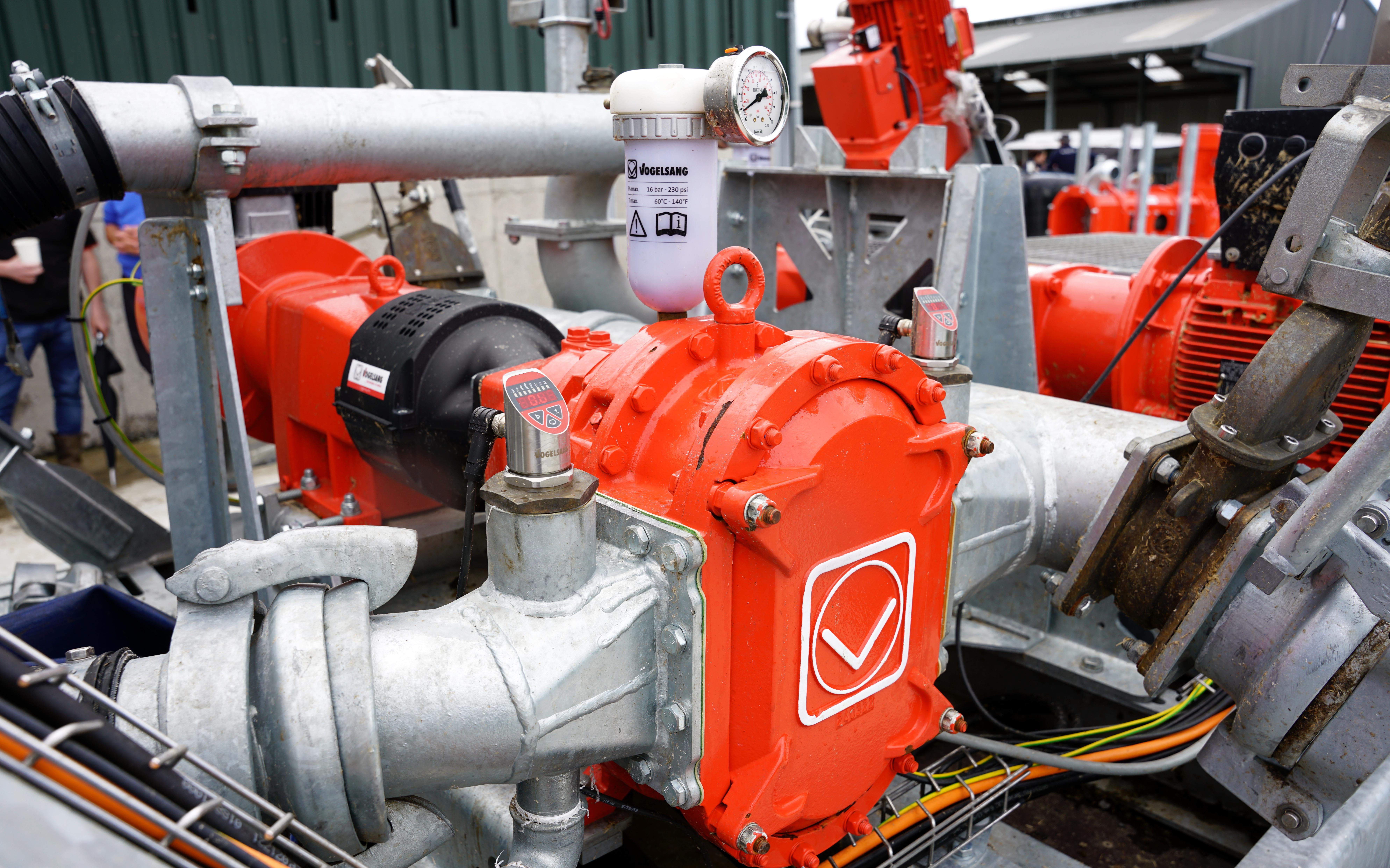 The discharge pump in the foreground is powered by the same motor as the delivery pump which sits at the far end of the shaft