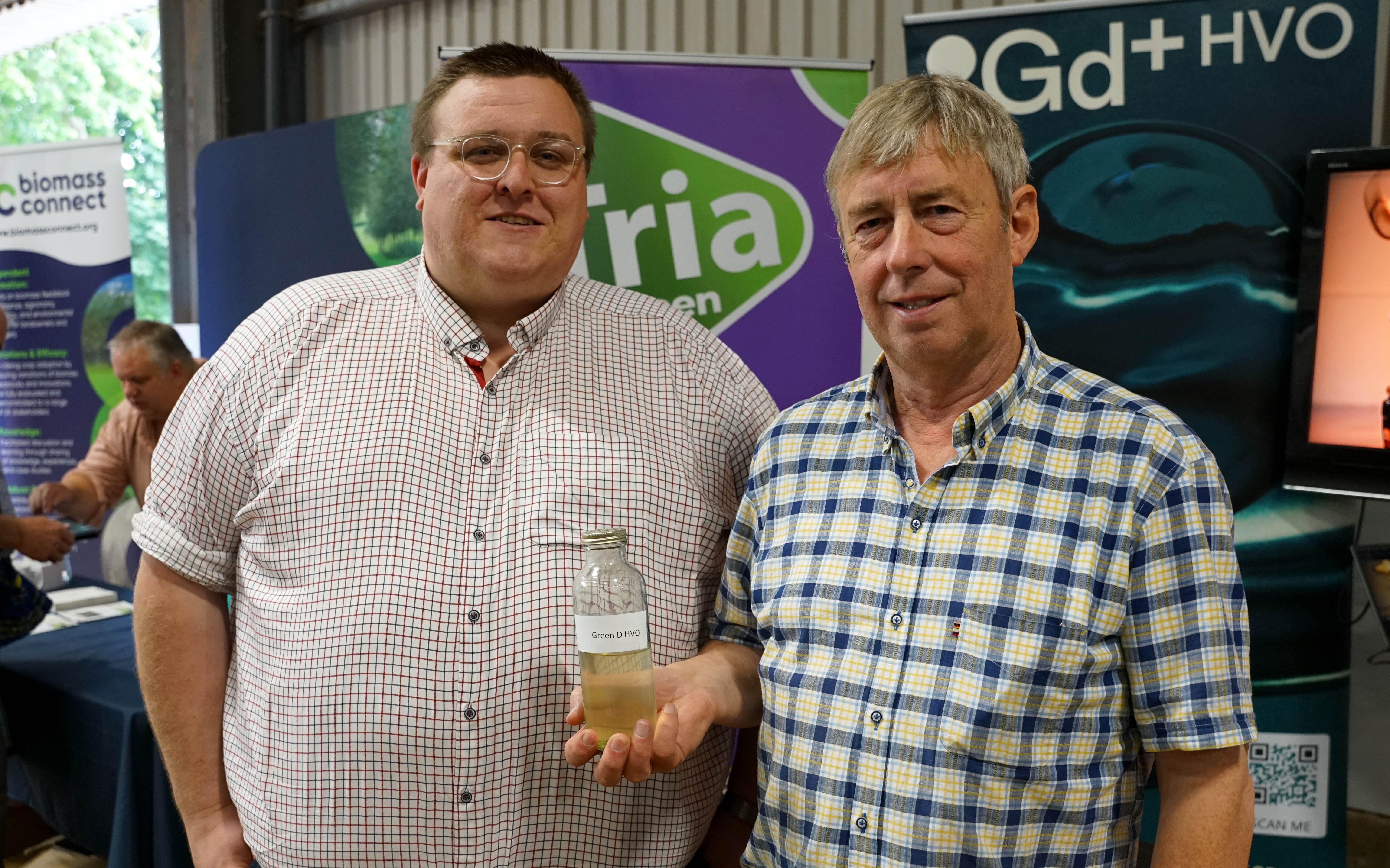 Thomas Flynn and Pat Murnane of Tria with a sample of the company's HVO which remains useable down to -40°C