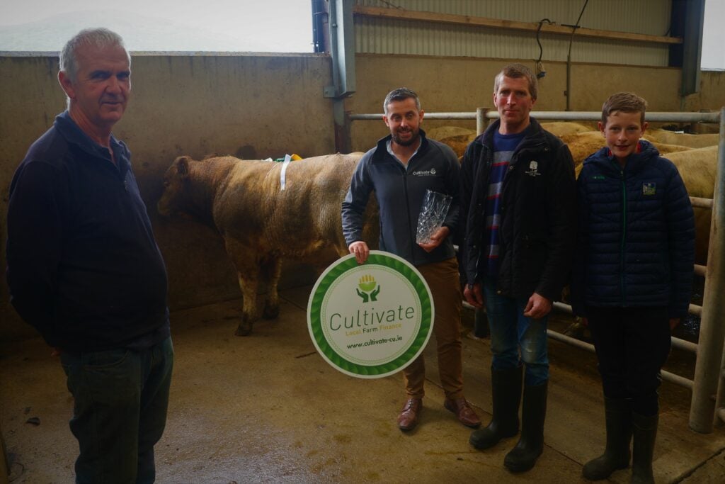Mart manager Mike Kissane (left) pictured with the champion weanling bull weighing 460kg. The August 2022-born bull sold for €1,650 or €3.59/kg