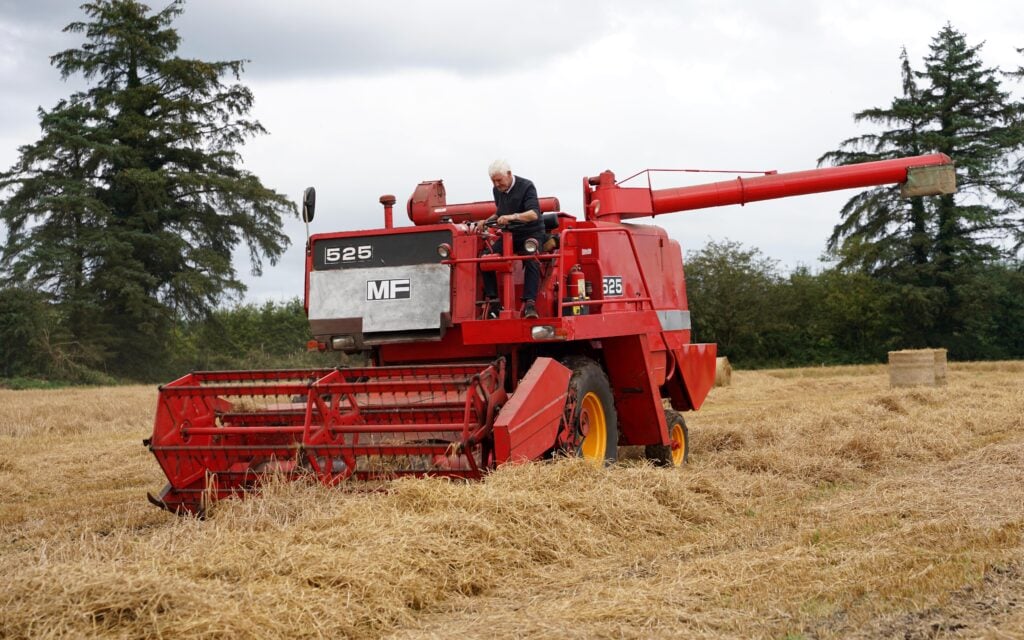 Noel at the wheel of the MF 525 combine equipped with a 10ft header