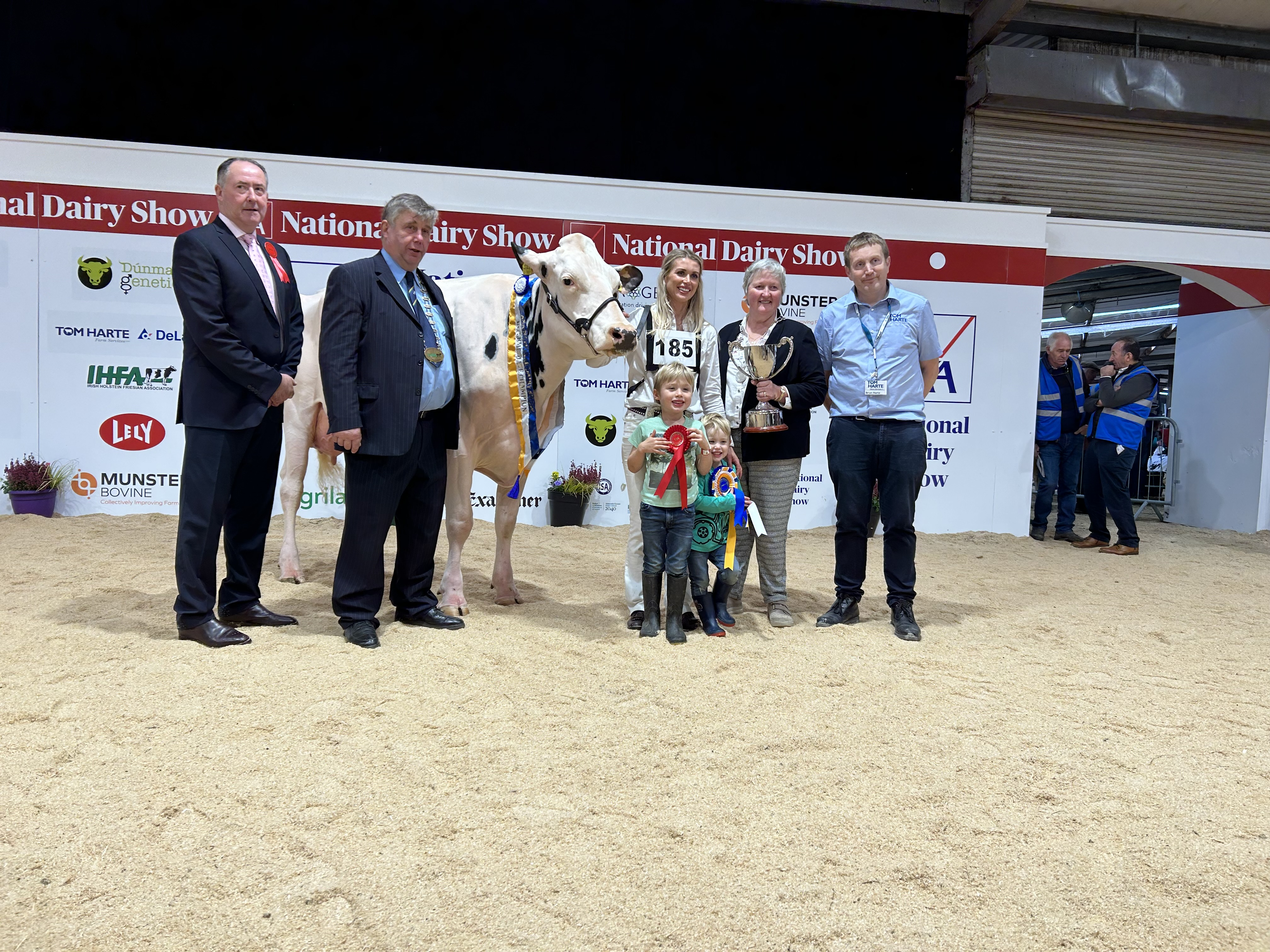 Judge Ashley Fleming, Richard Hamilton IHFA president, Izzy Jones with Jones Lambda Twizzle, Ted and Rory Jones, Ursula Forrest President of Cork Club and Brian Harte from Tom Harte Farm Services
